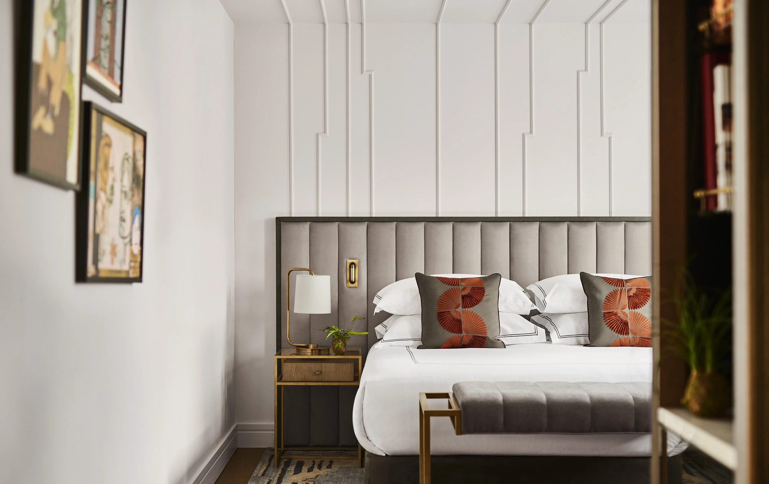 Elegant executive room at Gran Hotel Inglés in Madrid, Spain, featuring plush bedding, modern decor, and designer accents—ideal for travelers seeking luxury accommodations in central Madrid.