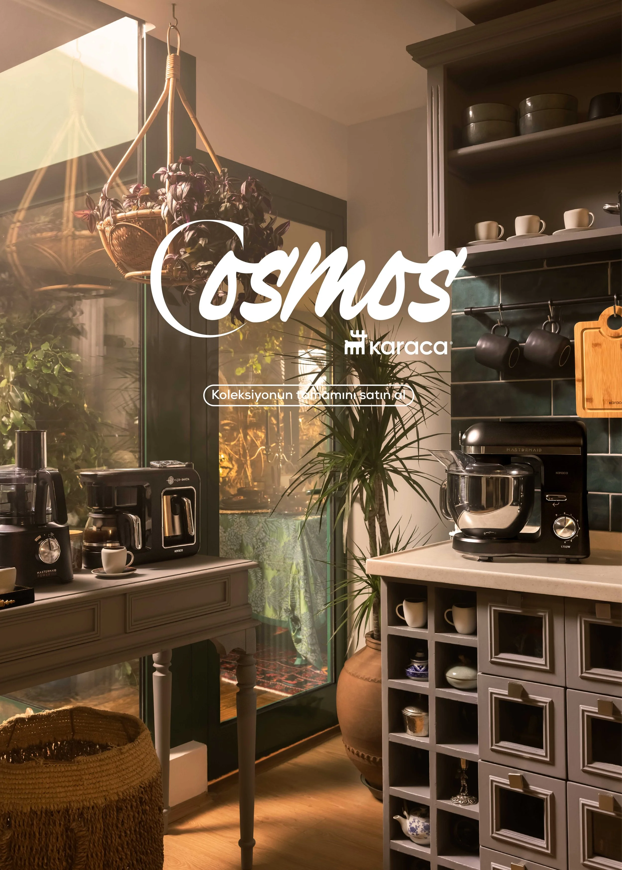 Interior of a cozy kitchen with dark green tile backsplash, white cabinets, open shelves with cups and bowls, a white countertop, and black kitchen appliances. A large potted plant is next to a window with sunlight streaming in. There's a table with 