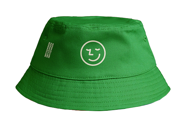 Green bucket hat with a white smiley face logo and text on the side.