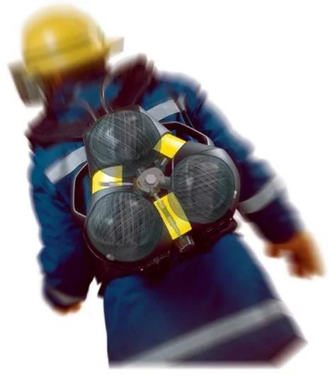A firefighter in full gear walking away, with a self-contained breathing apparatus on their back.
