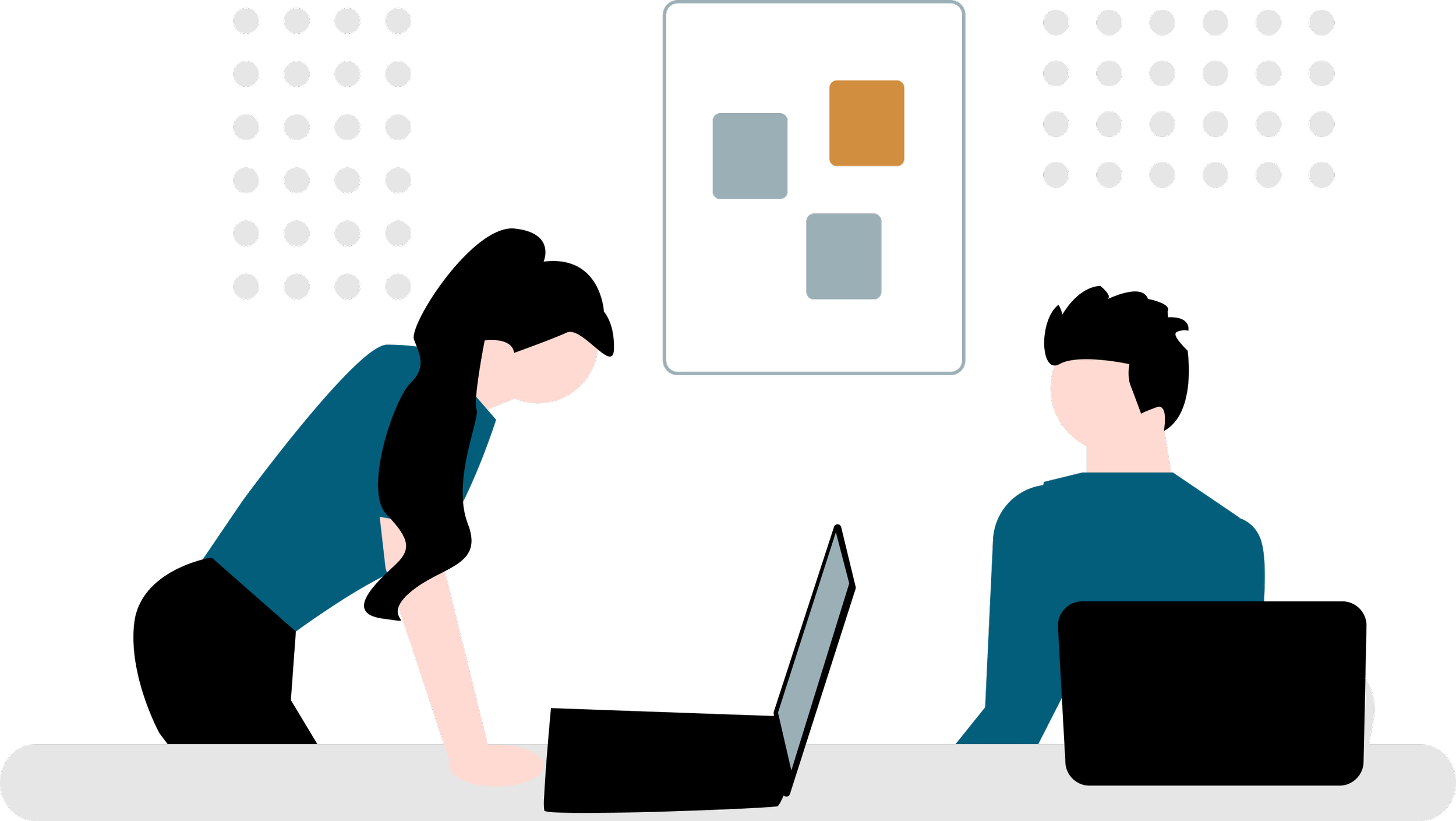 Two people in a meeting room with computers and a presentation screen displaying colored boxes.