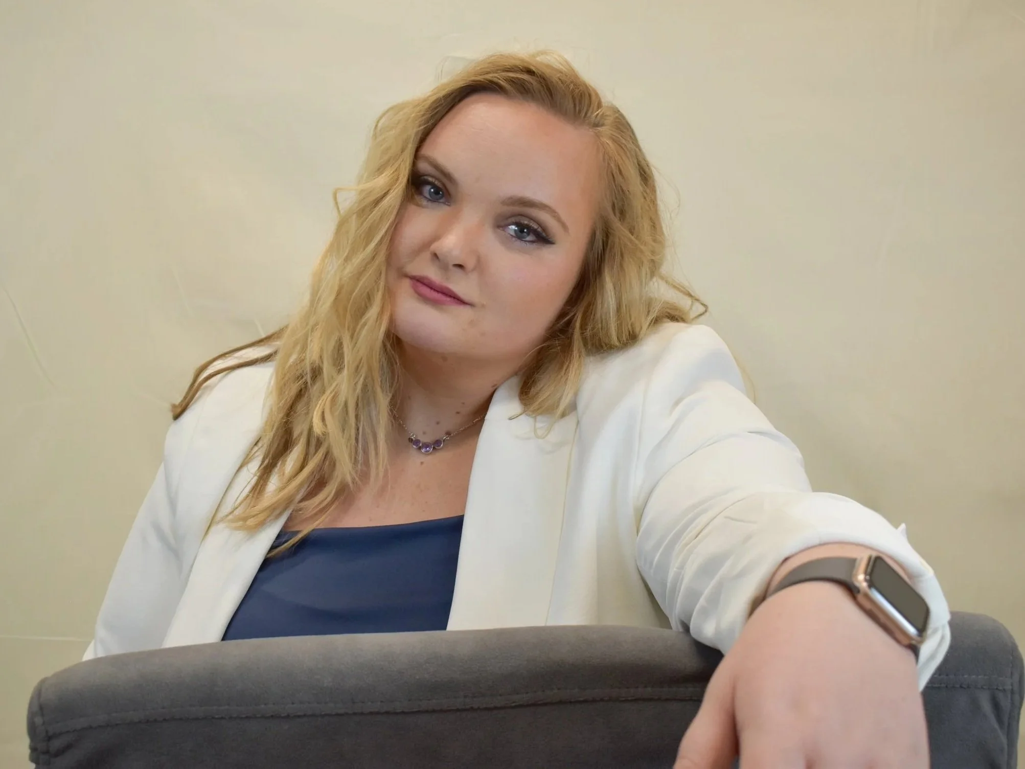 Creative marketing strategist planning social media content and branding strategy for small business clients. marketing consultant and photographer Grace Kathleen Burns working with small businesses and nonprofits on branding and content creation.