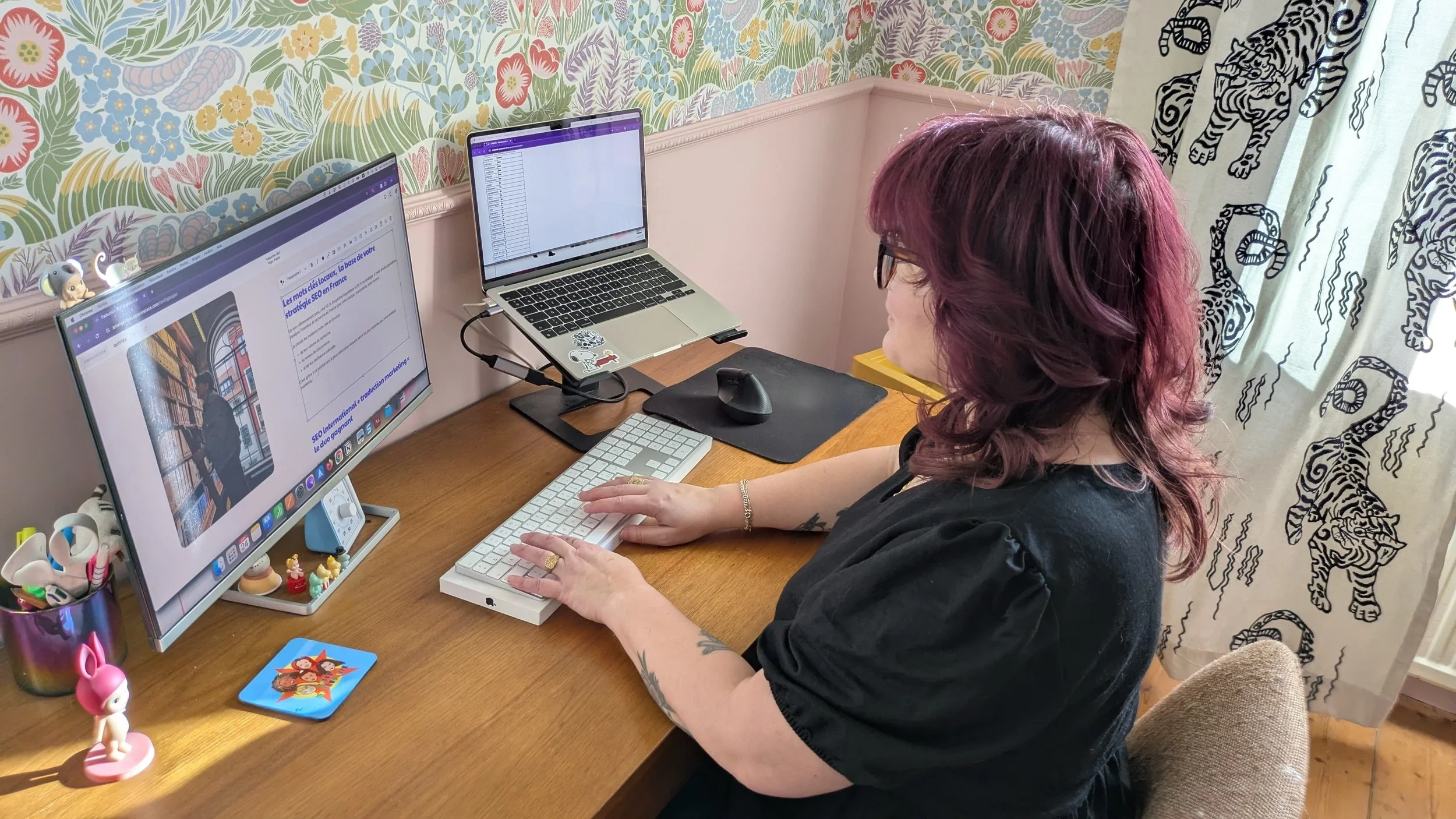 amélie hennequi, english to french translator, at her desk, black dress, purple hair