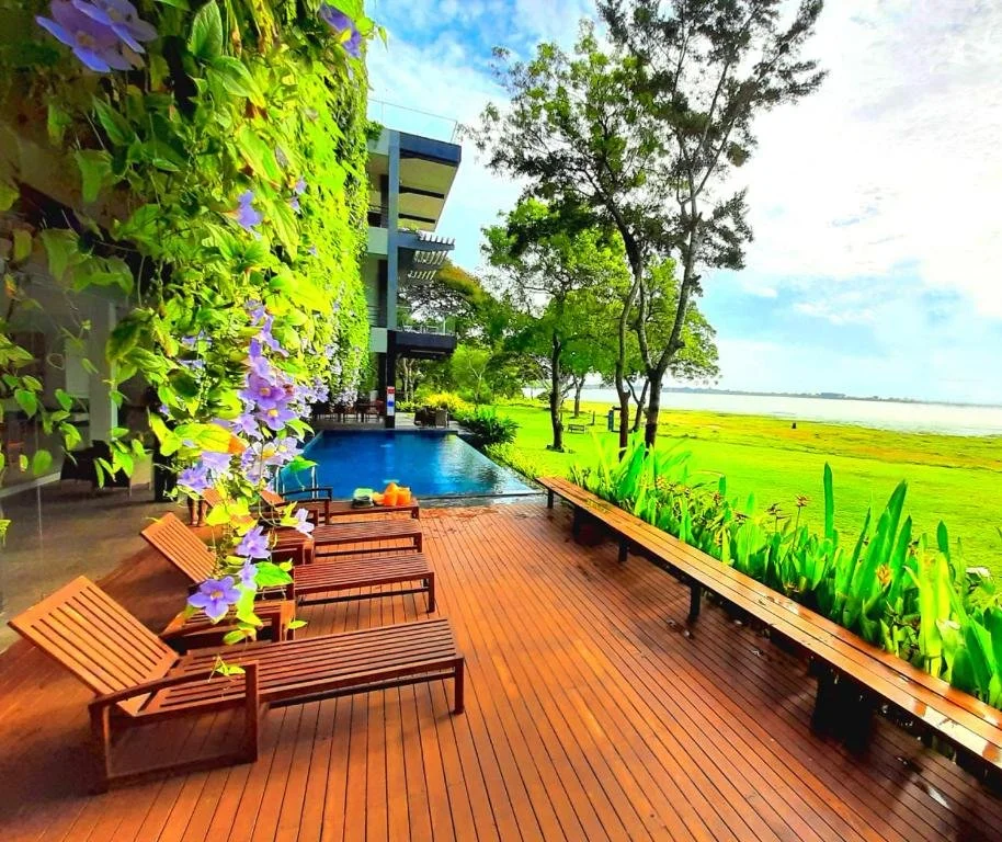 Swimming pool overlooking Tissa Wewa at The Lake Forest Hotel in Anuradhapura