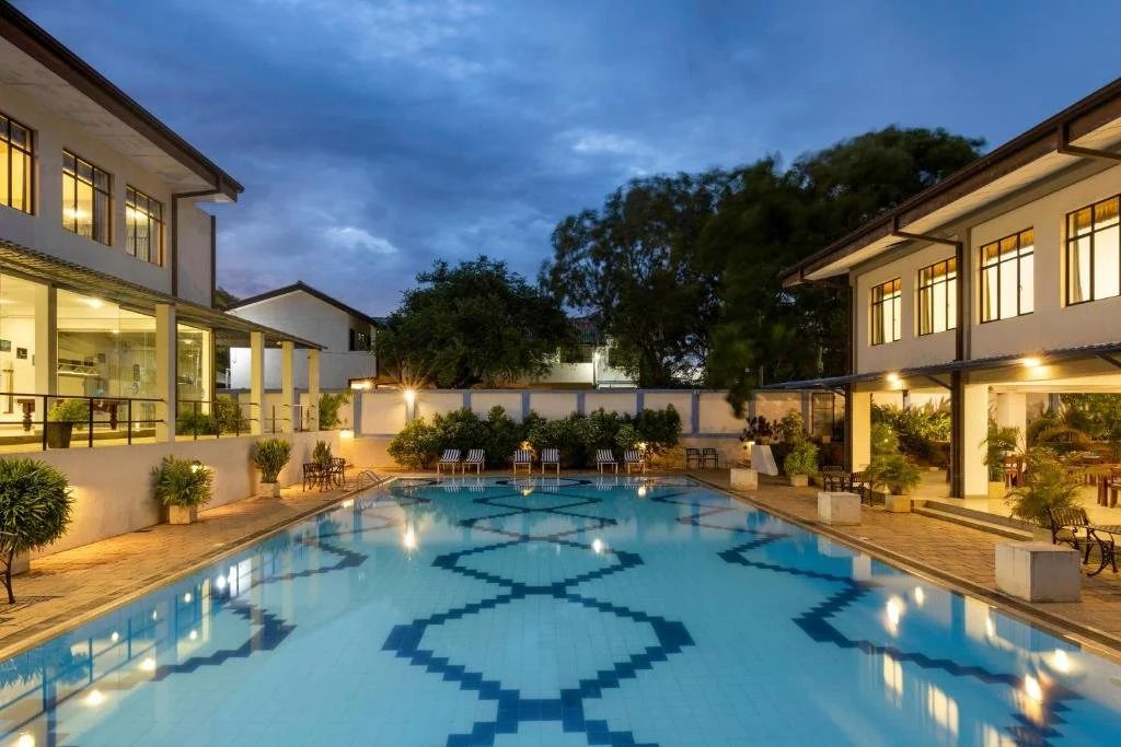 Illuminated swimming pool at The Blue Wave hotel in Arugam Bay