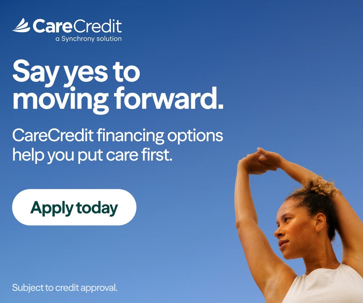 A woman doing a stretching pose against a clear blue sky, promoting CareCredit financing options.
