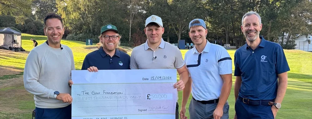 Rob Beckett and Fore Bros with cheque