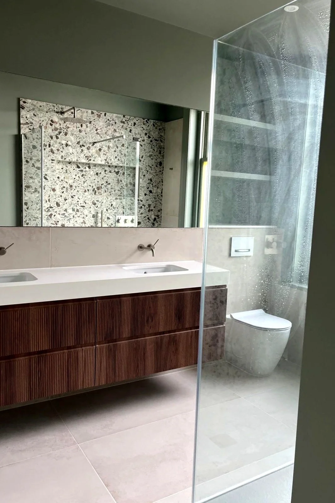 Contemporary bathroom with double vanity unit and walk-in shower