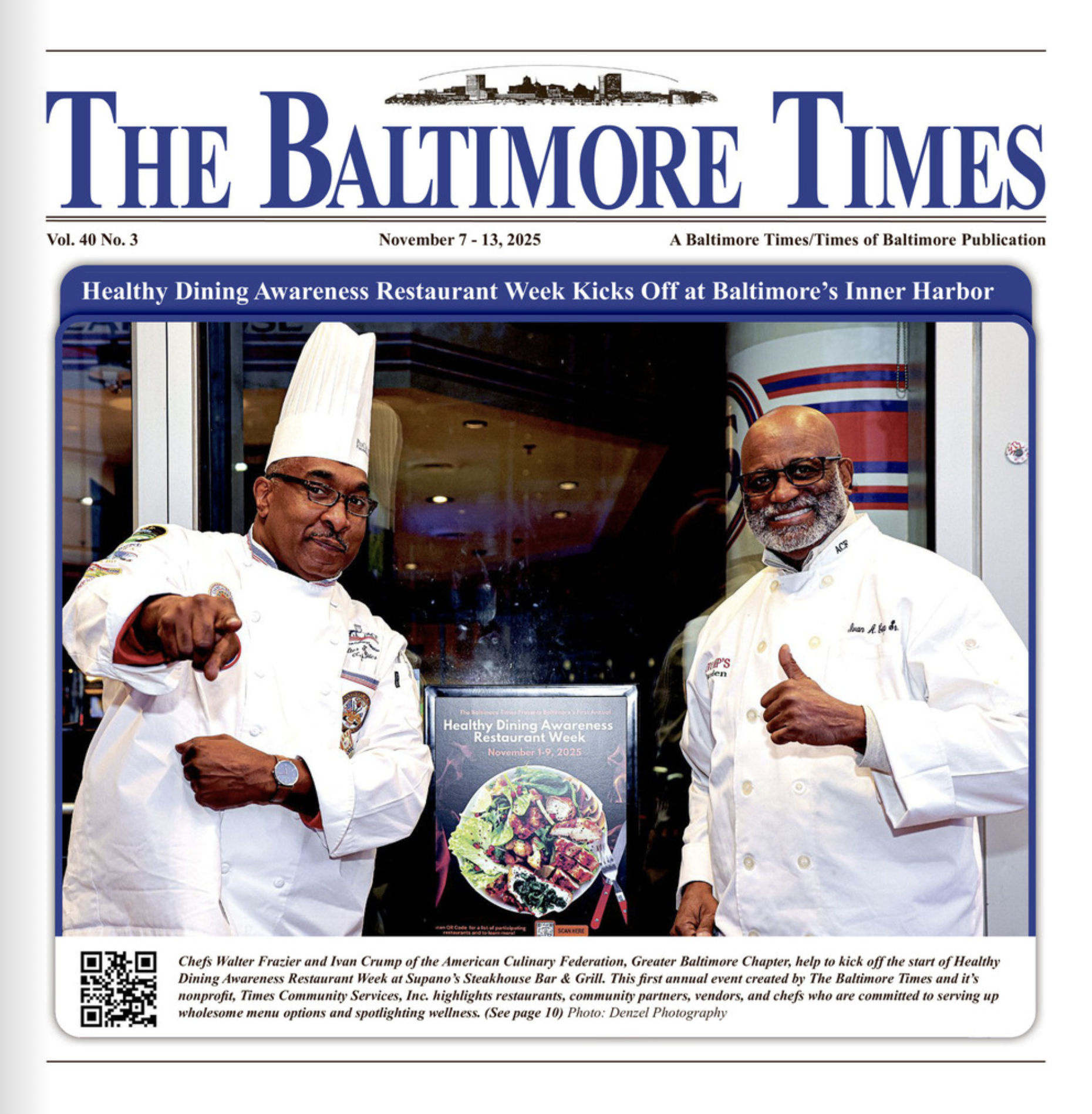 Two chefs in white uniforms and chef hats standing outside a restaurant, pointing and giving a thumbs up during a health awareness event in Baltimore, Maryland.