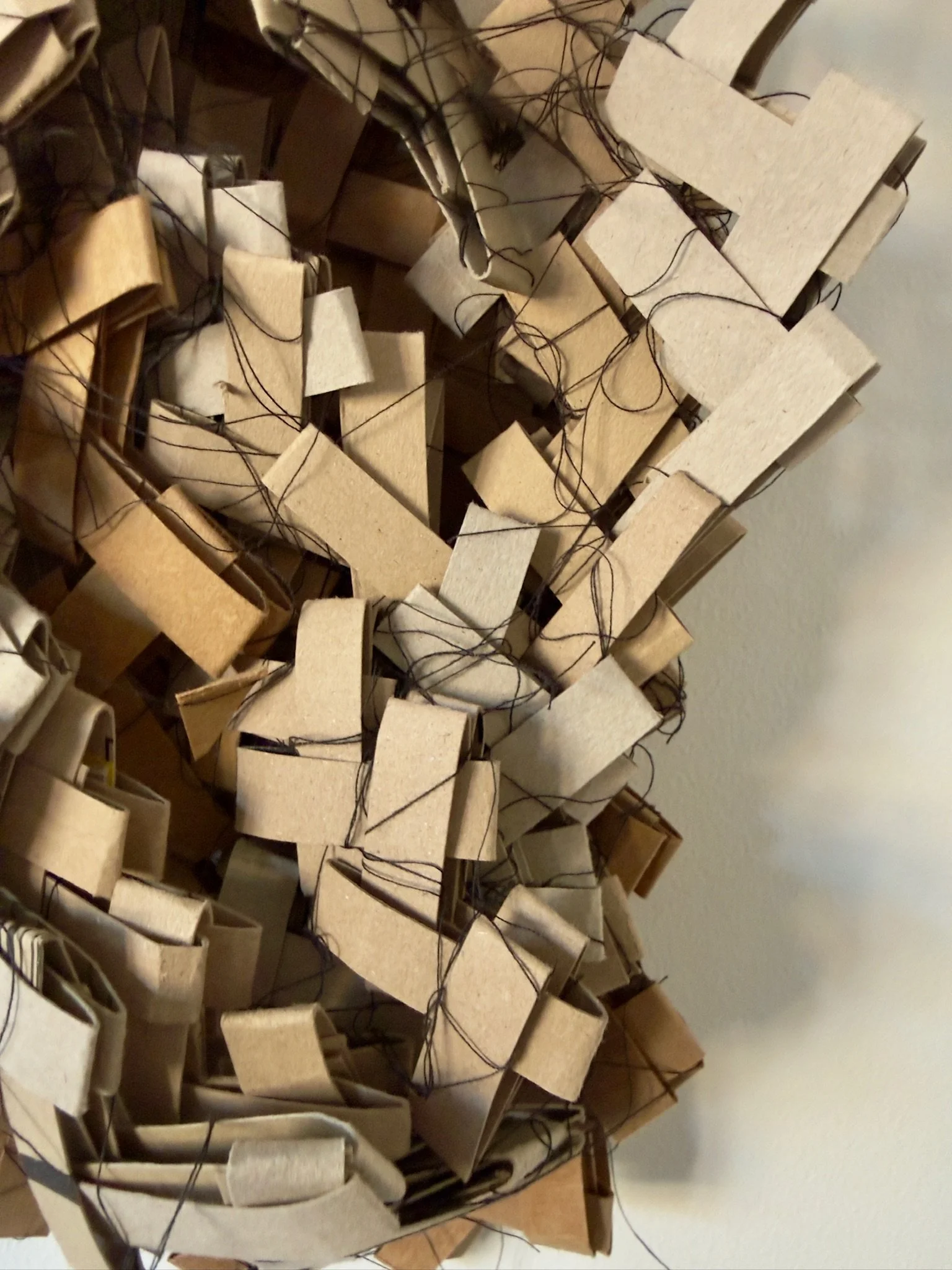 Track your Parcel  (Detail 2) Nov 2025. Amazon Packaging, Thread and masking tape. Image: Richard Beach