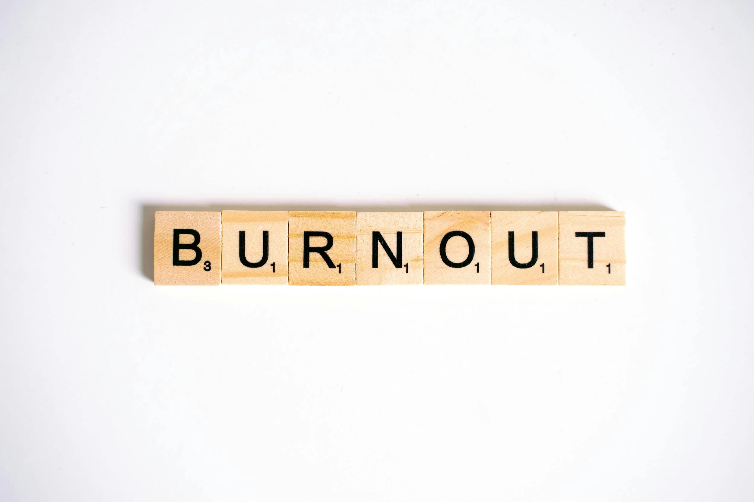 Burnout spelt out on scrabble board