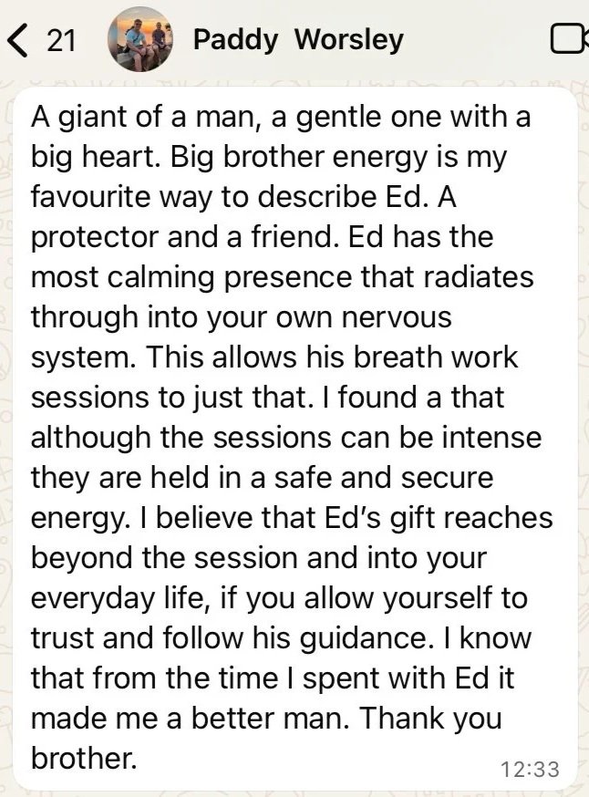Screenshot of a text message discussion about a person named Ed, describing him as a gentle, big-hearted man, protector, and friend, who provides calming presence and guided breathing sessions.