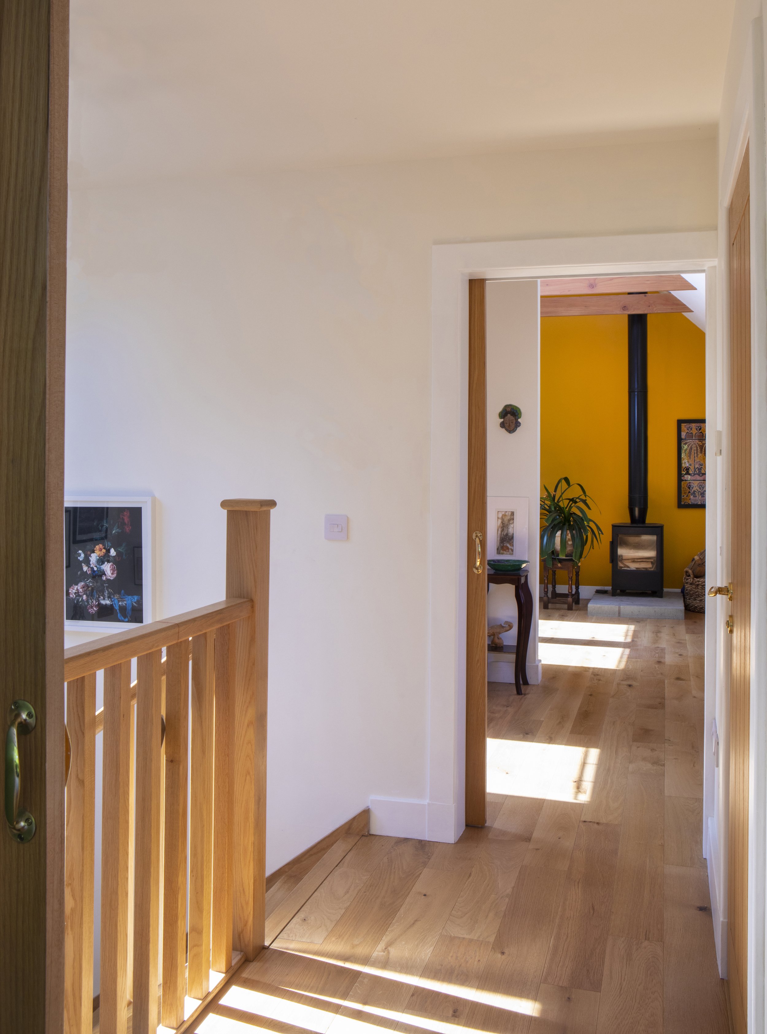 Tully Beg House, a view on the second story level looking through to a bright room.