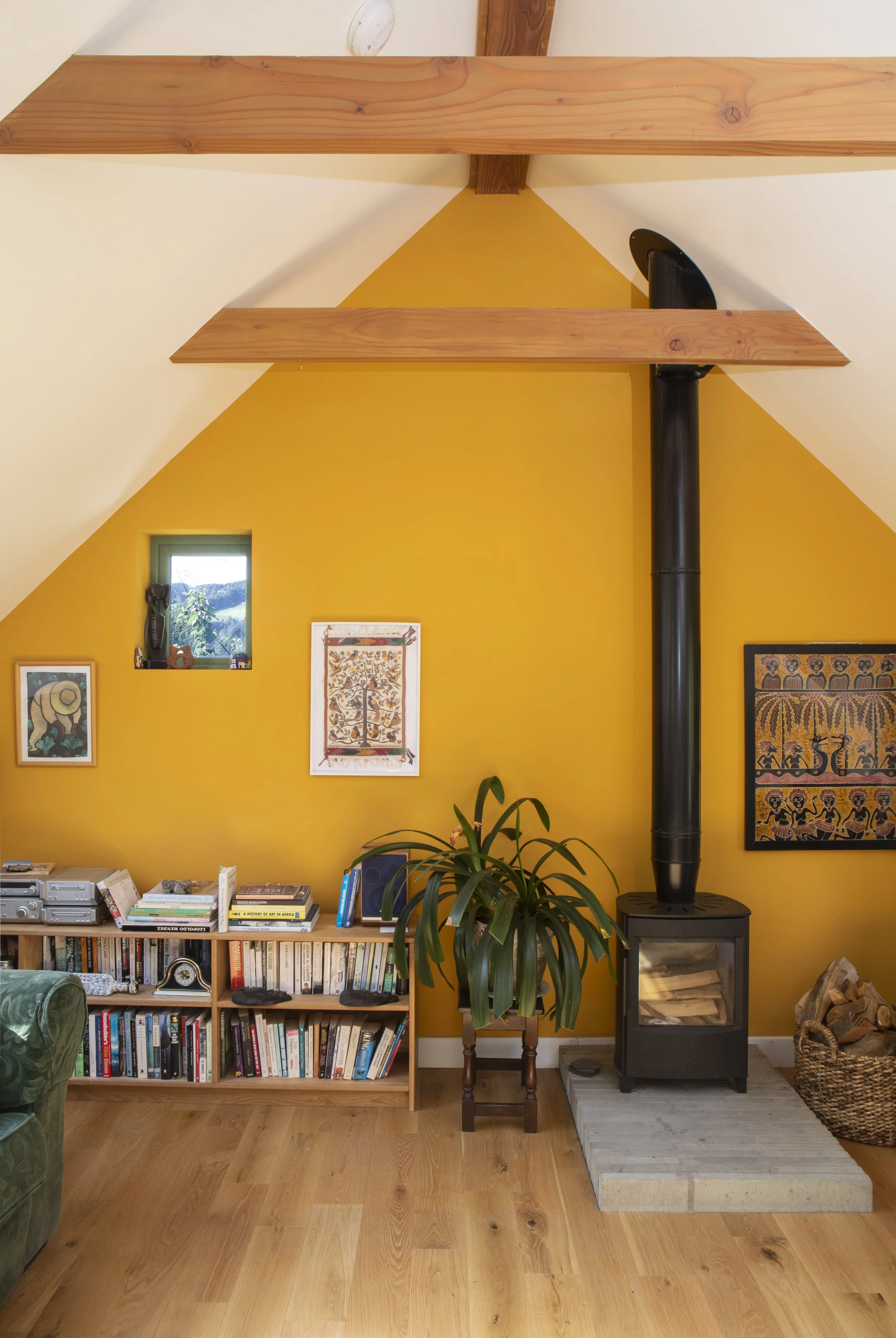 Tully Beg House, a cosy living space with a wood burning stove.