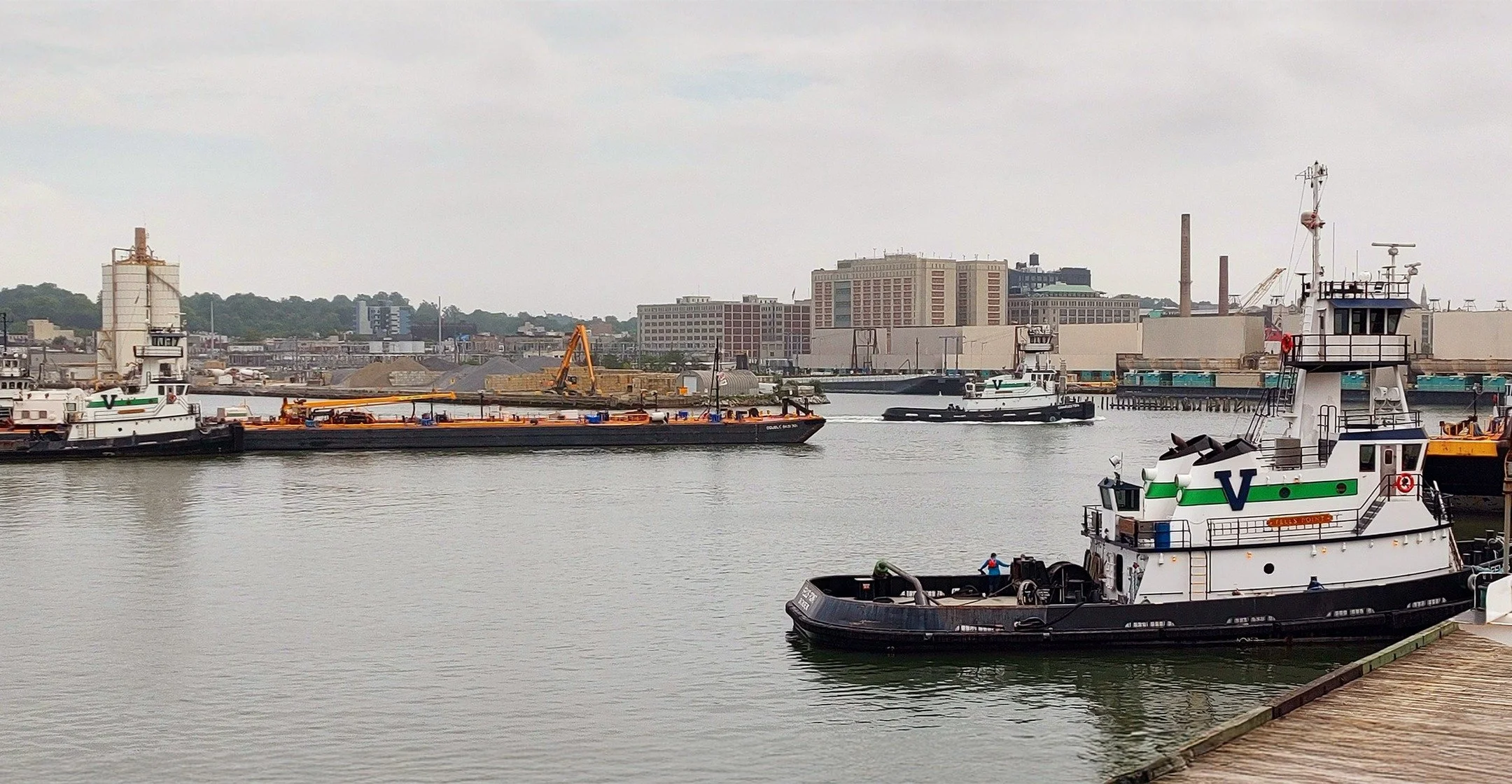 A gathering of Vane Brothers vessels last spring in NY. ... Just a little while longer until we see leaves on the trees again! [Photo by Ralph Gundersen] #TheVaneBrothersCompany #Tugboat #Barge