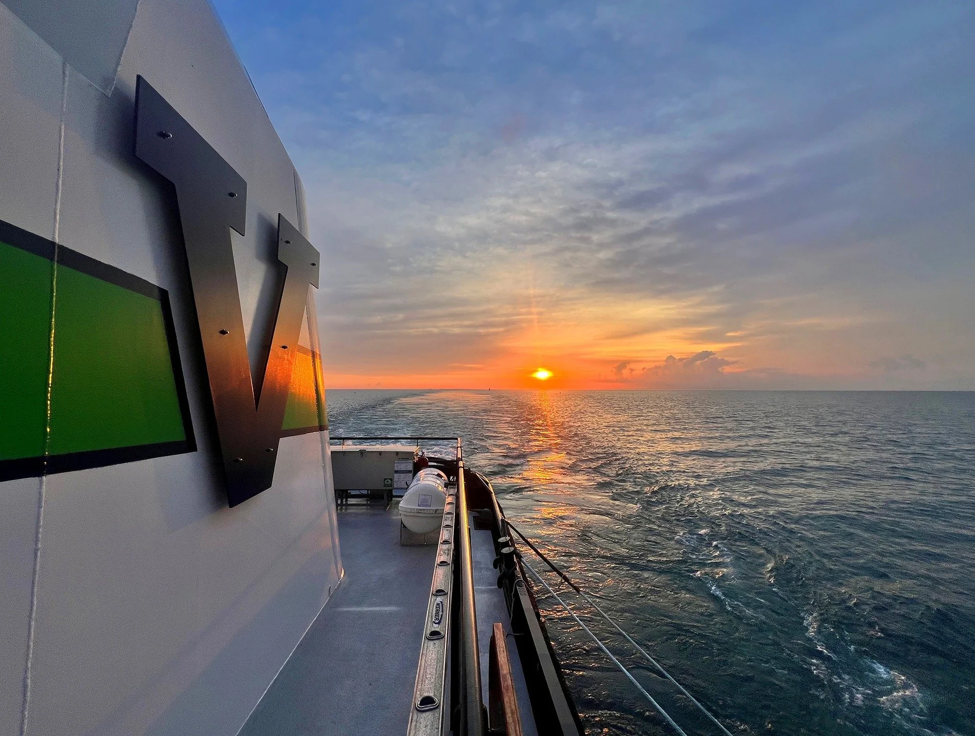 Looking from the deck of the Vane Brothers tug NEW YORK toward a sunset on Lake St. Clair, Michigan. [Photo by Hope Jeffries] #TheVaneBrothersCompany #Tugboat #NewYork #LakeStClair