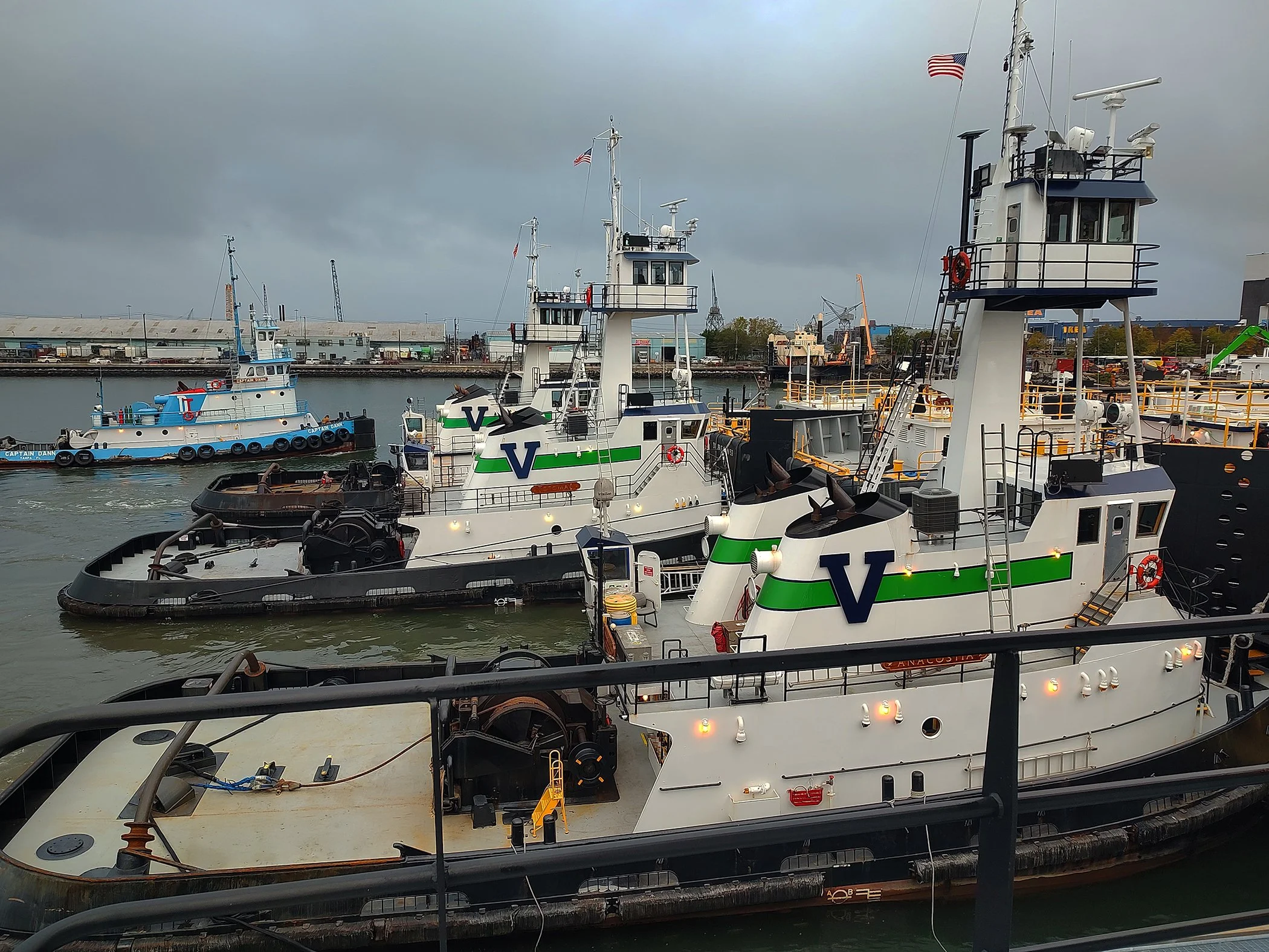 Three Vane Brothers tugs (FORT McHENRY, ANACOSTIA, and POTOMAC) at the ready with the barges Double Skin 57, 503, and 53 at the Henry Street Pier, Manhattan. [Photo by Ralph Gundersen] #TheVaneBrothersCompany #Tugboat #Barge #FortMcHenry #Anacostia #
