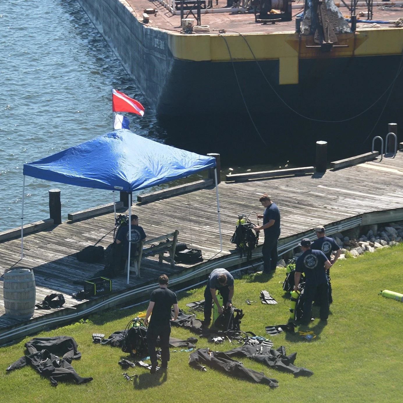 Vane Brothers welcomed members of the Baltimore Police Department's Underwater Recovery Team who are "keeping their skills up to date" while training with a Jackstay device that is used to conduct underwater inspections of vessels (in this 