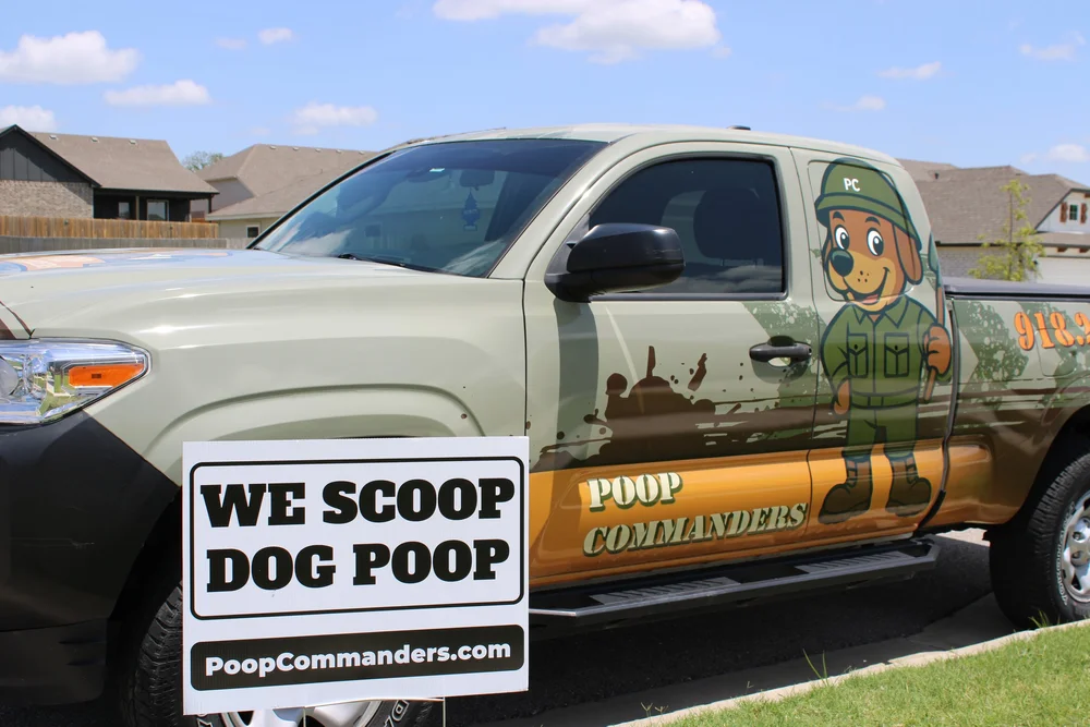 Poop Commanders yard sign and service truck