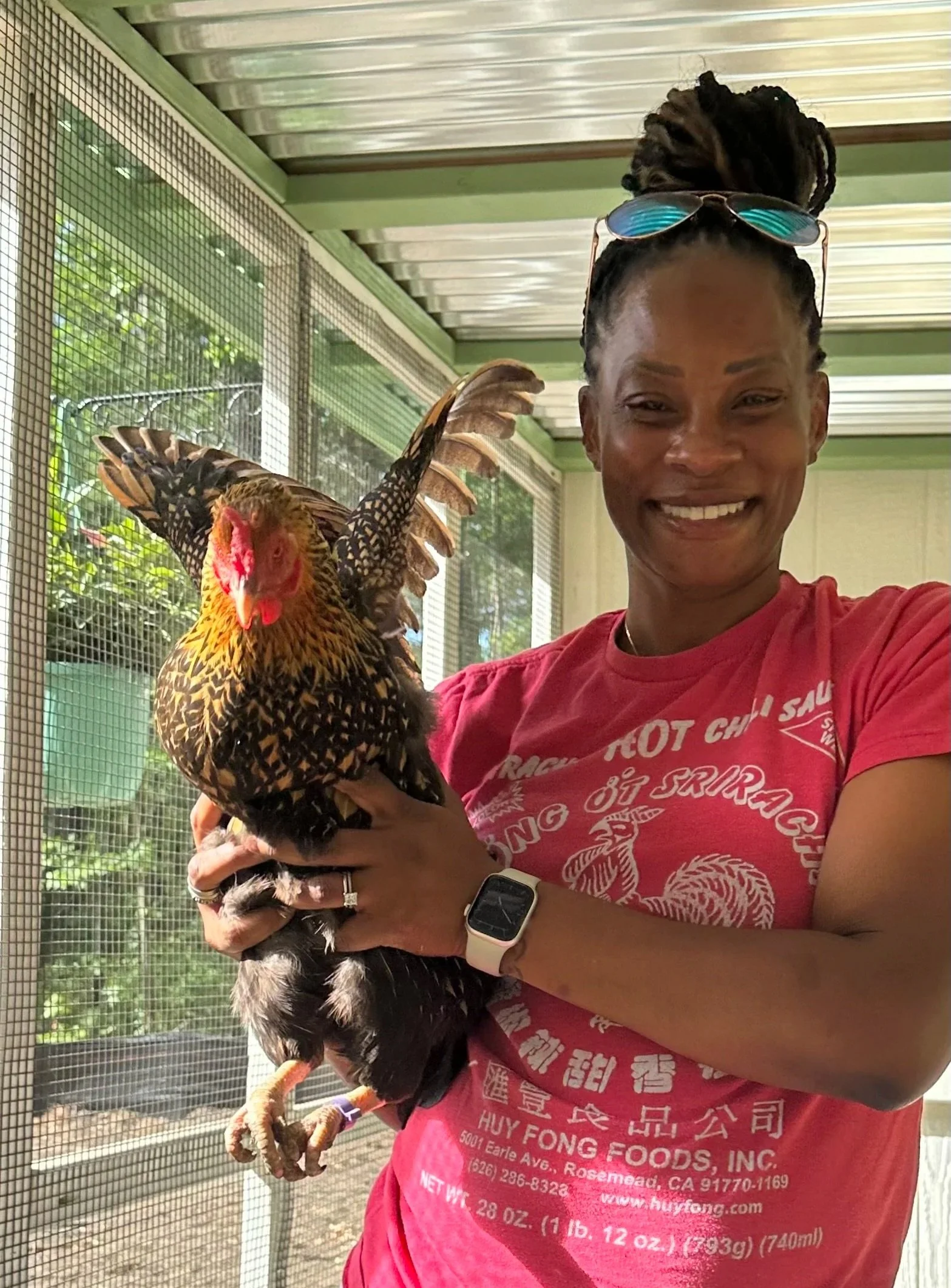 Lauren holding a Rooster