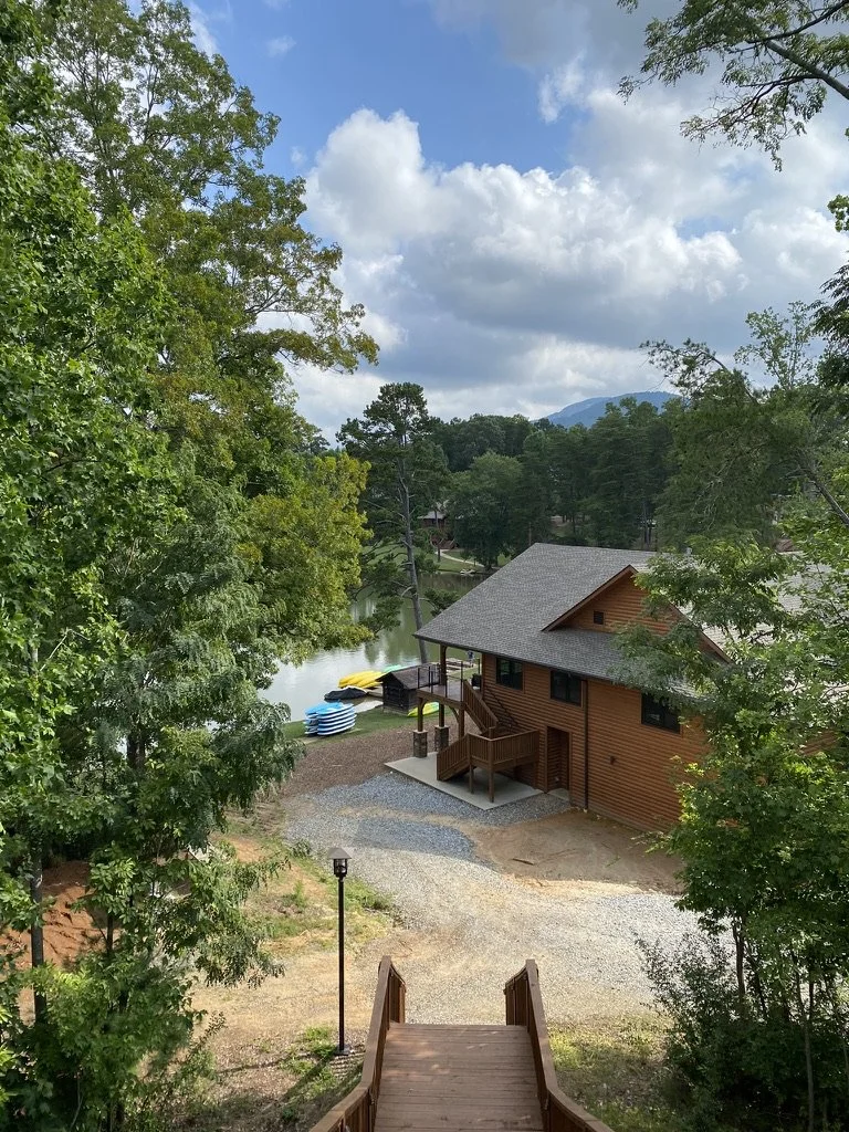 Wide view of Woodland Camp, including the lodge