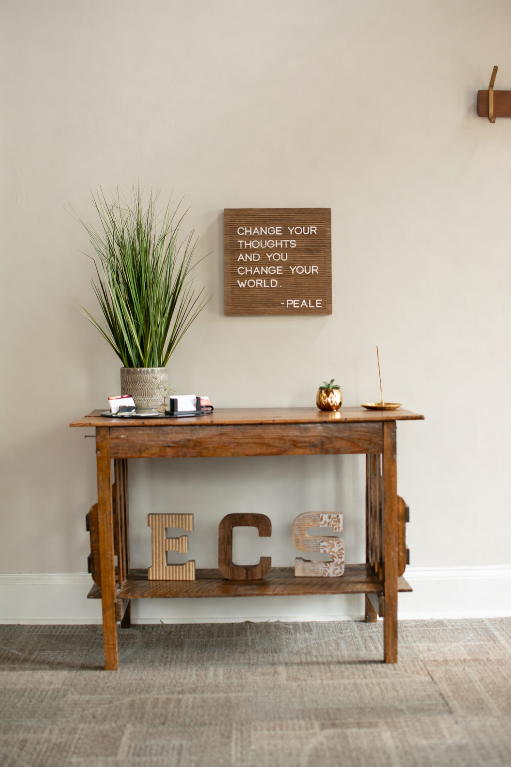 Welcoming Waiting room table with plants and artwork