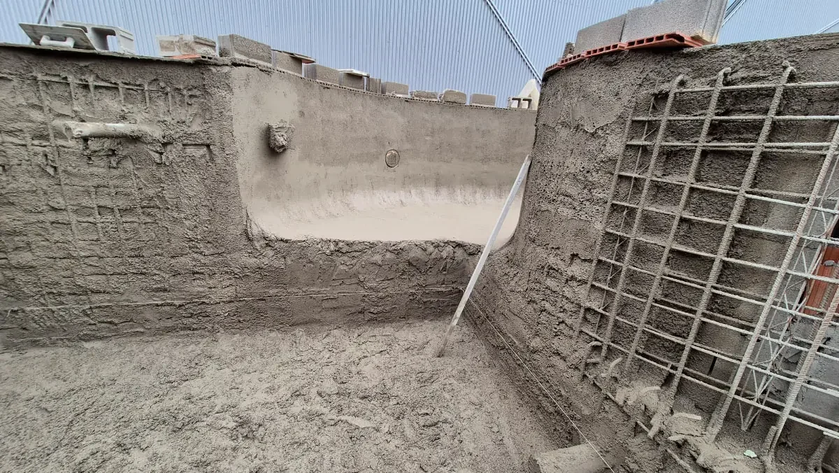 Under construction of a concrete pool with cinder block and rebar reinforcement