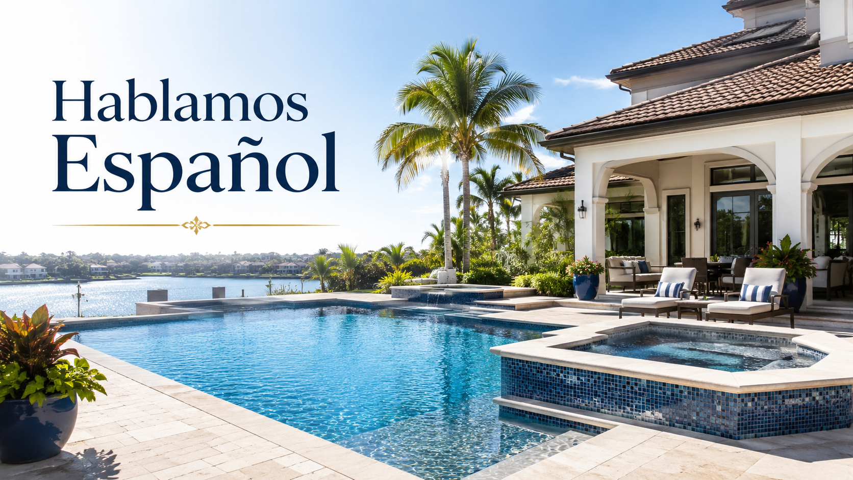 Luxury house with a swimming pool and hot tub, palm trees, outdoor seating area, and lake view in the background.
