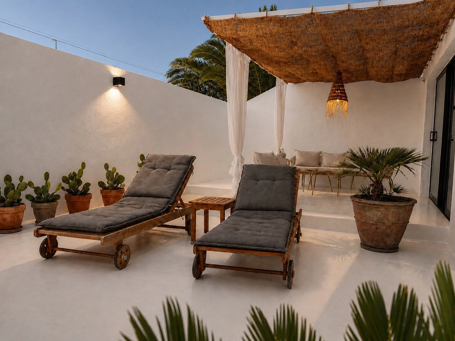 Private terrace with sun loungers, designed for relaxed outdoor living in Lanzarote.