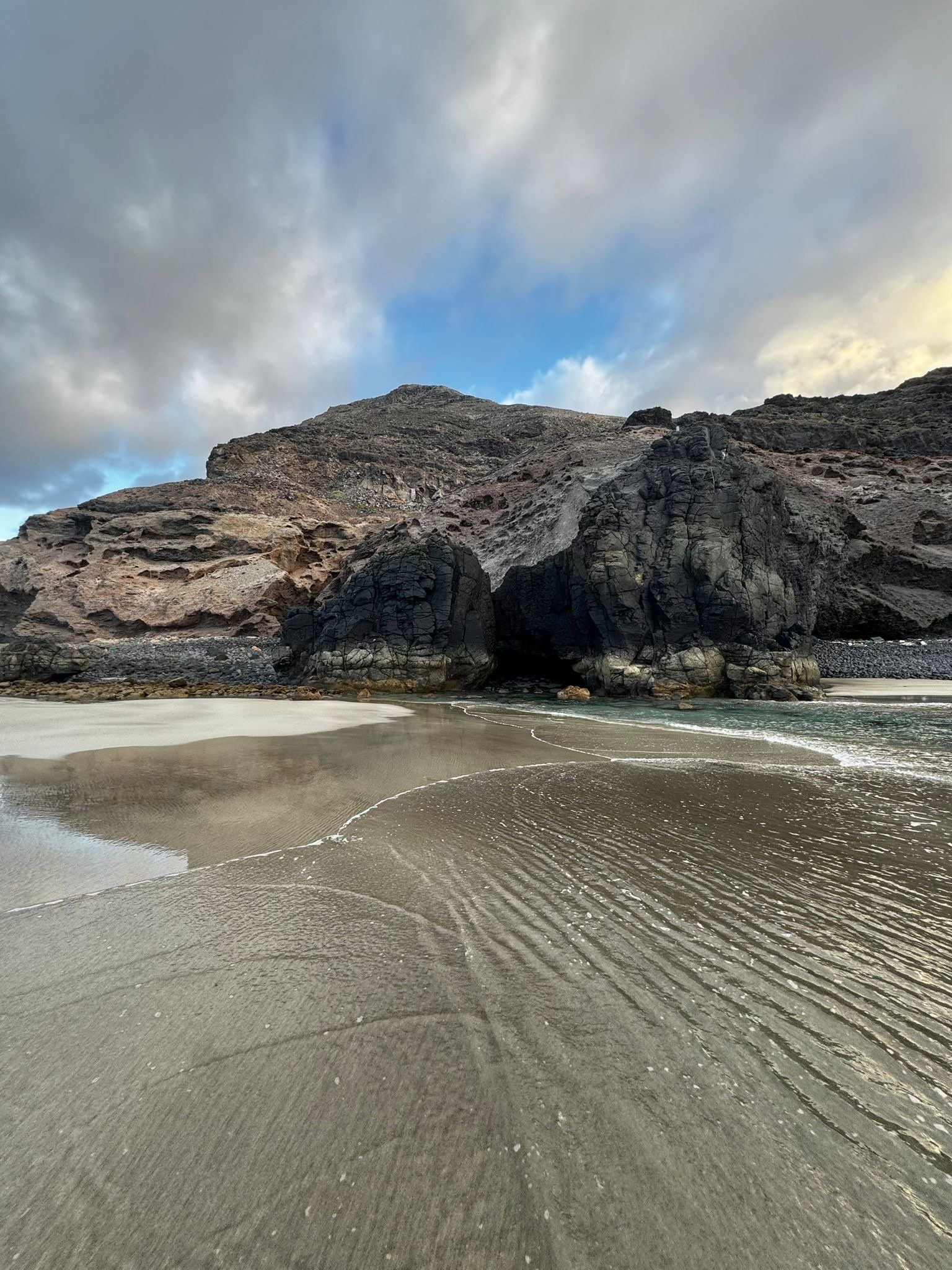 Hidden sea cave revealed by an extraordinary low tide at Playa de Las Canteras in northern Lanzarote.