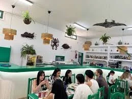 local people enjoying great food in teleclub tahiche.jpg