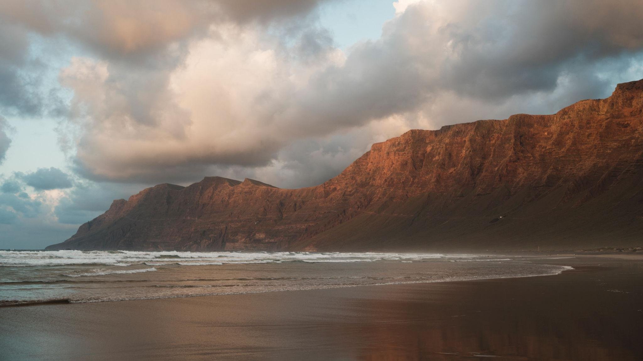 Famara beach beneath the dramatic Risco cliffs in northwest Lanzarote