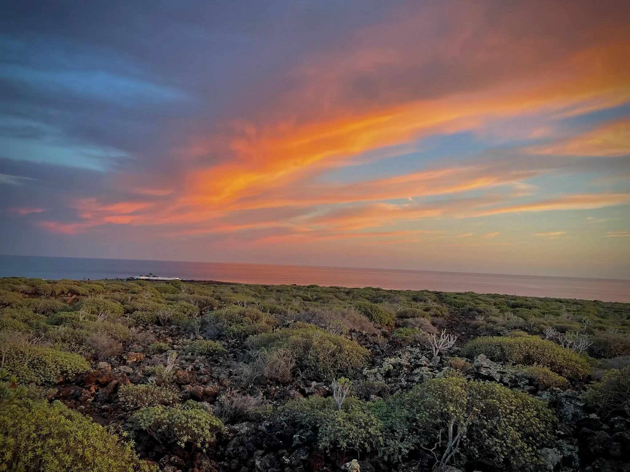 Sunset over the volcanic landscape of northern Lanzarote
