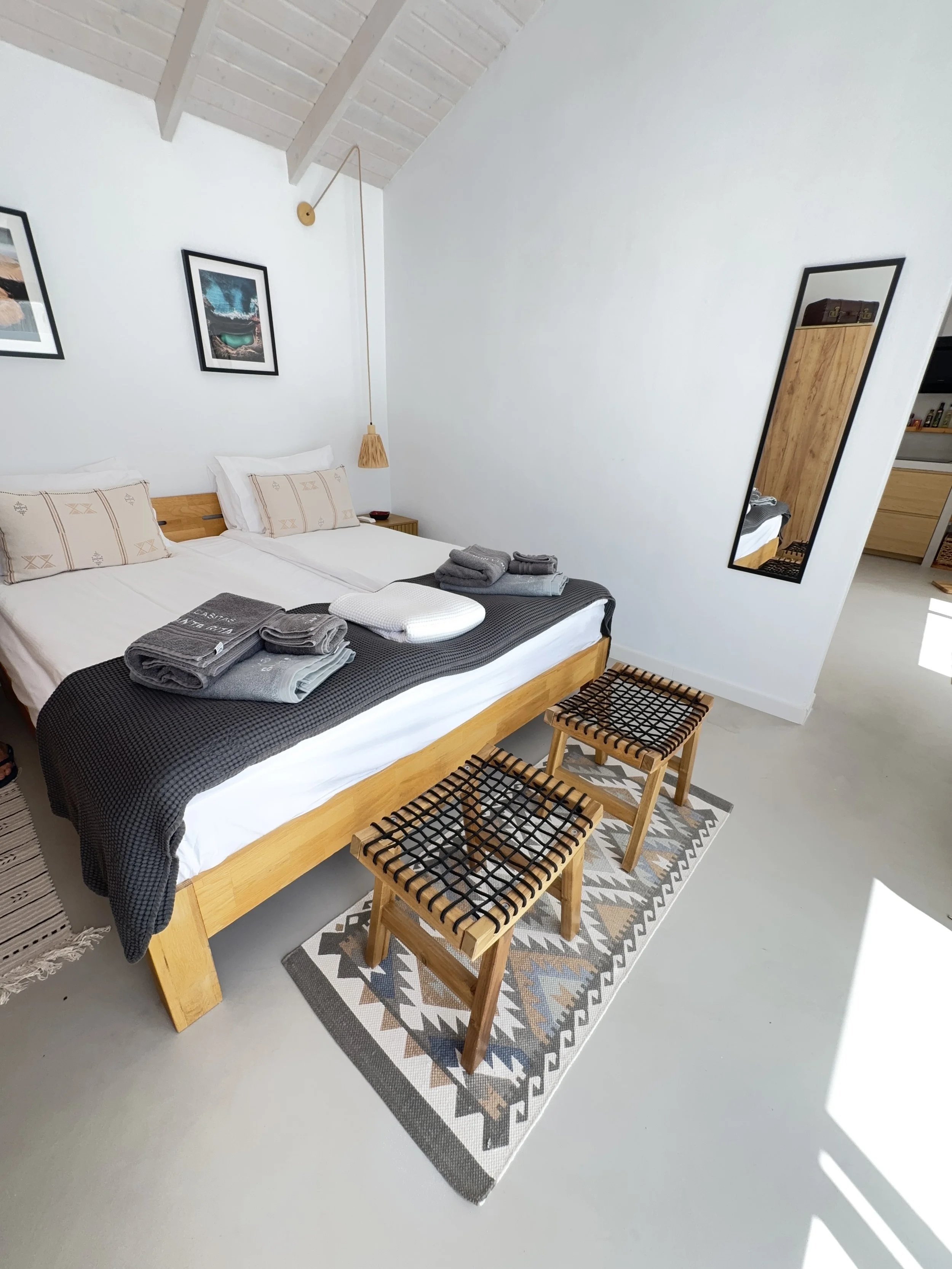 Bedroom textiles and natural textures at Casita Coco Lanzarote