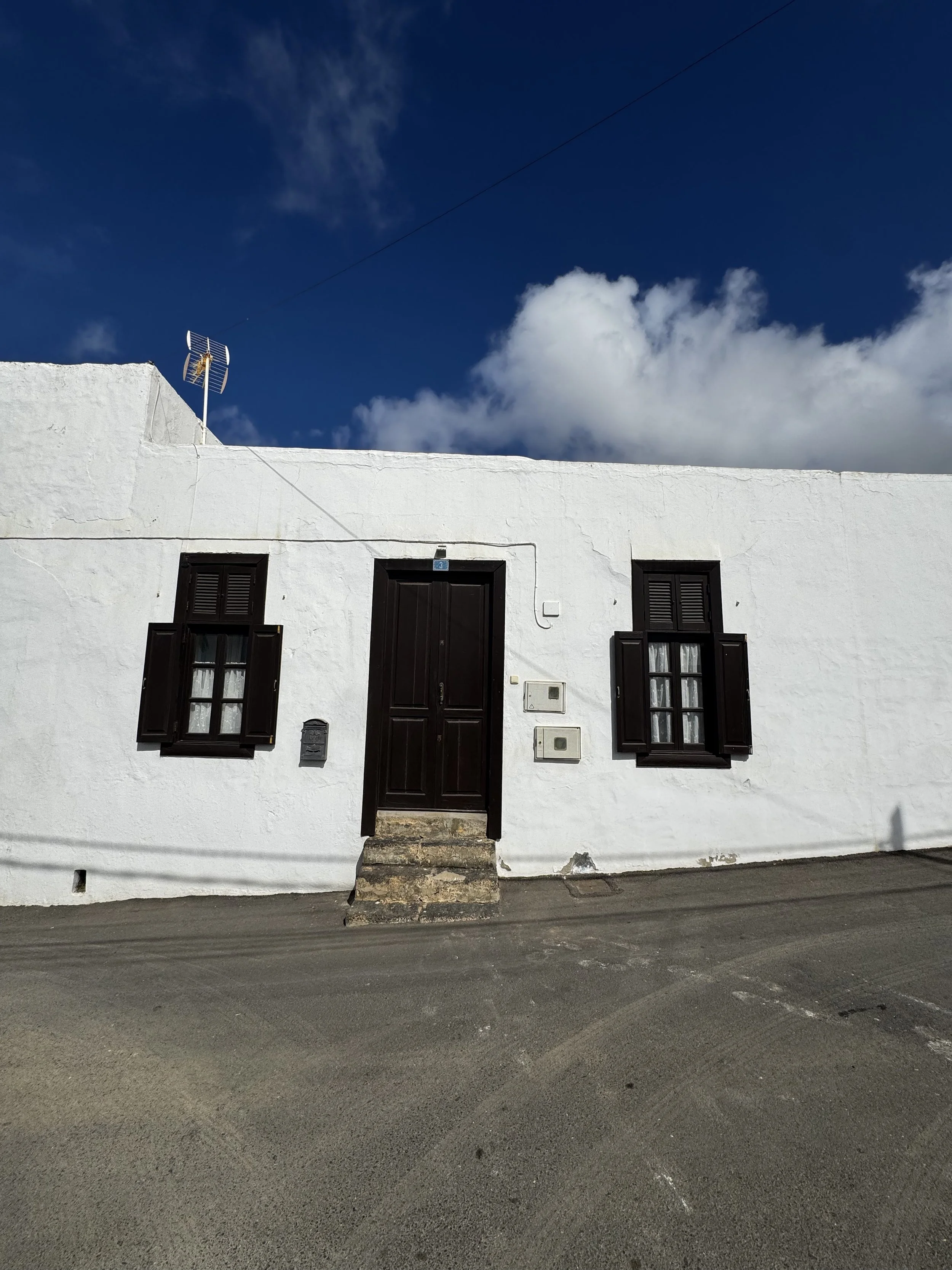 Traditional white village house in Guatiza, north Lanzarote with simple Canarian architecture.