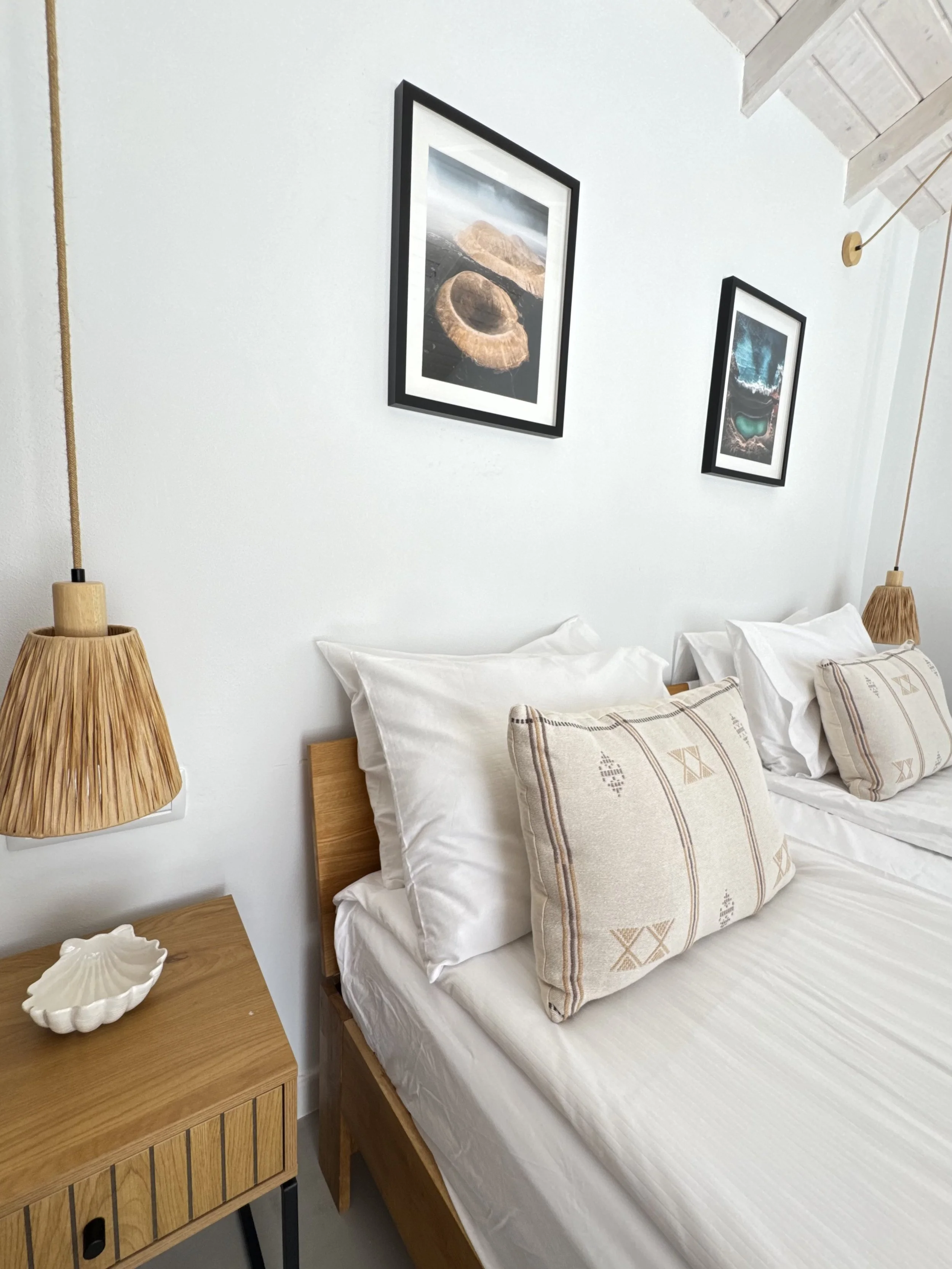 Minimal seashell bedside detail at Casita Coco Lanzarote boutique apartment