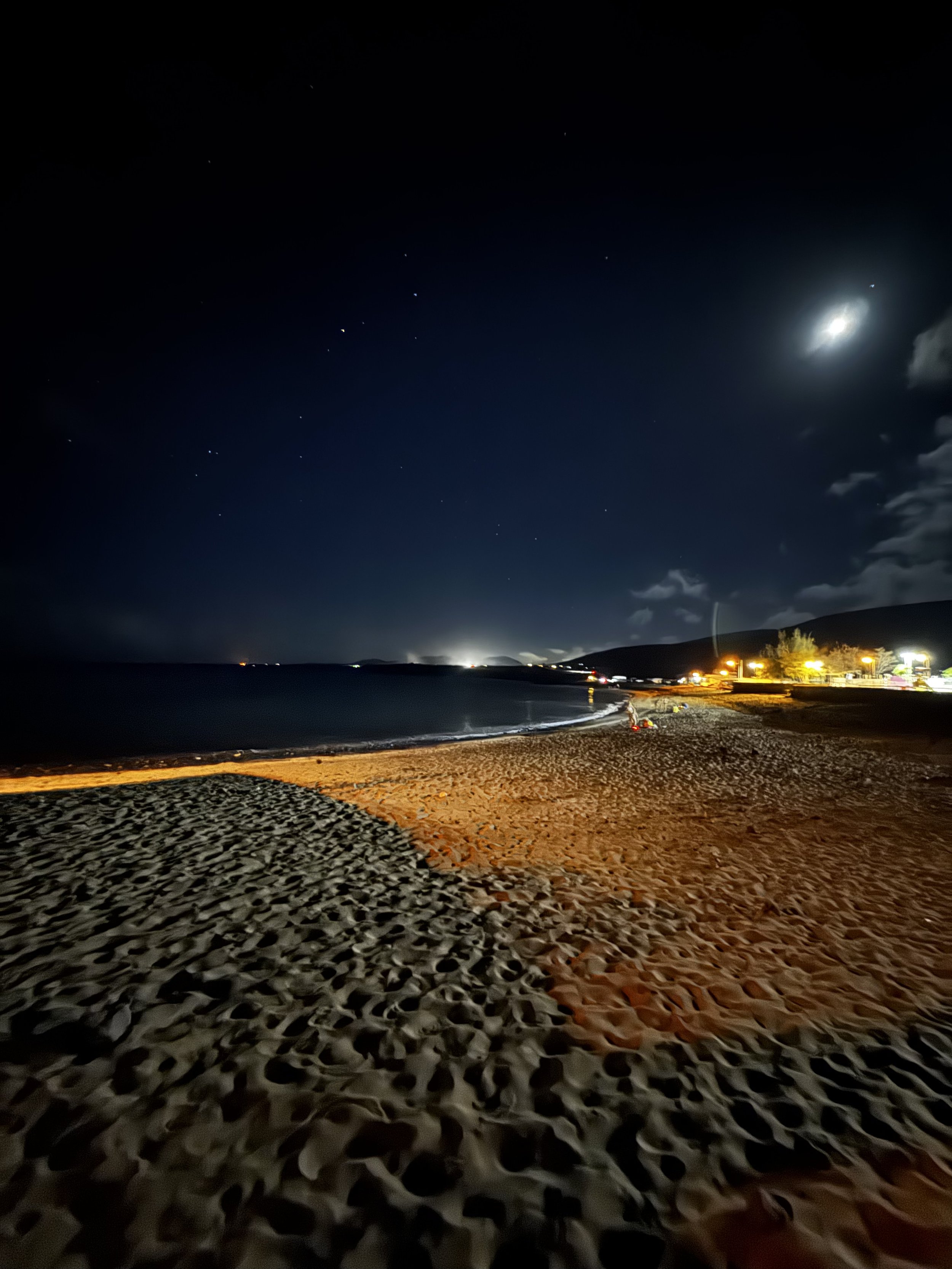 As midnight approaches, people begin making their way towards the coast.