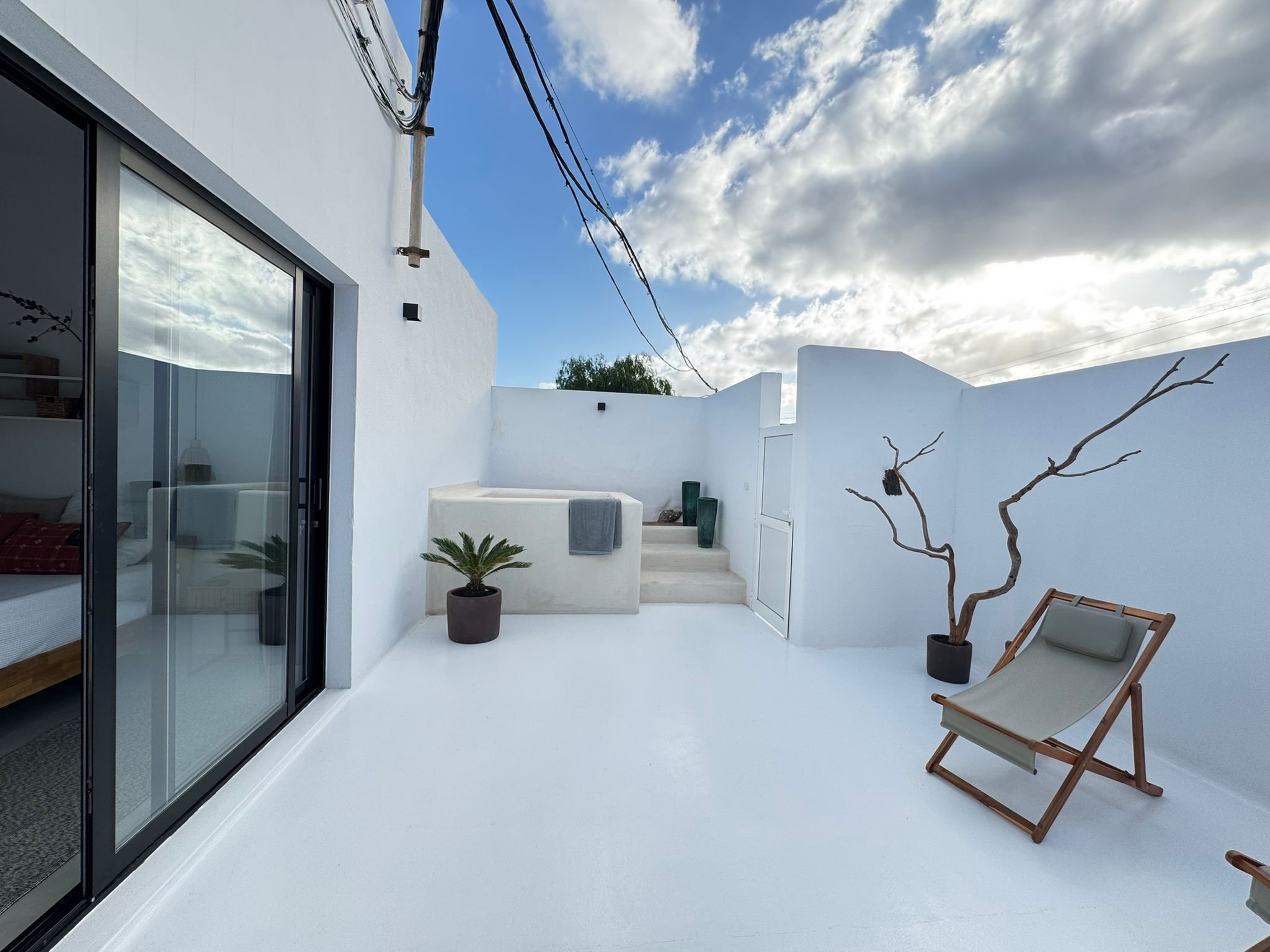 Boutique accommodation in northern Lanzarote featuring a private terrace, exclusive outdoor jacuzzi, natural design and a peaceful slow living atmosphere away from the crowds.
