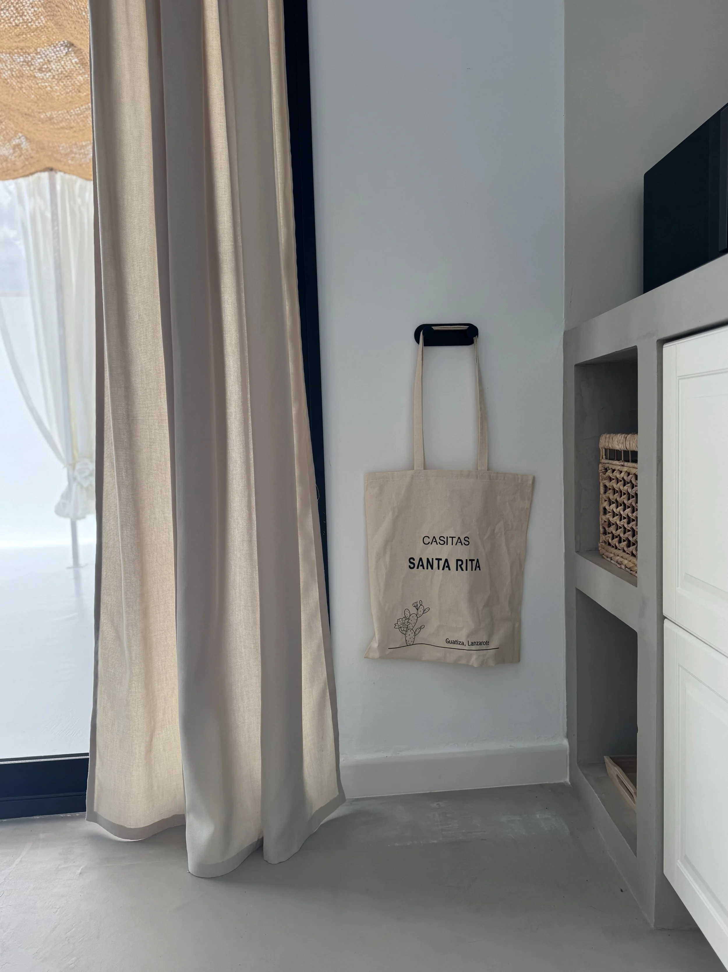 Linen curtain and boutique welcome tote detail at Casita Luna Lanzarote