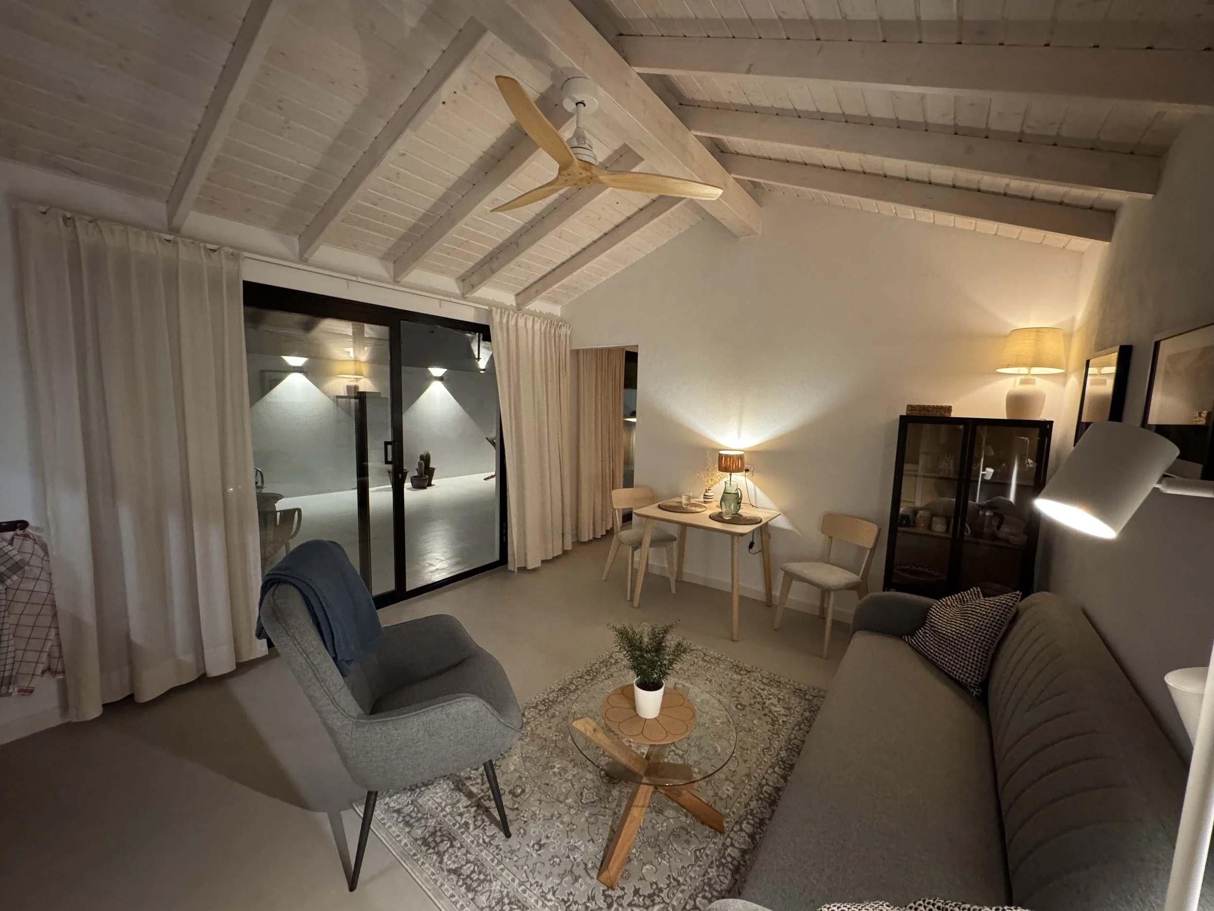 Minimalist living room at Casita Coco Lanzarote in evening light