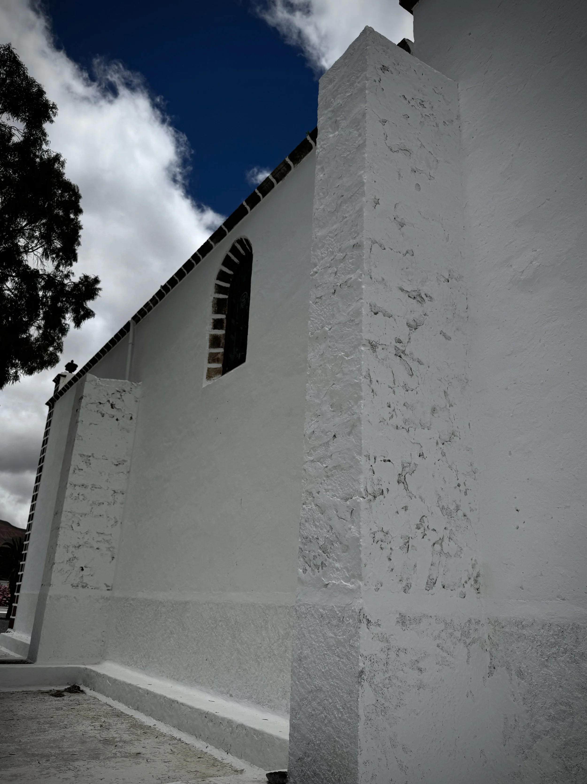 Recently renovated white church wall in Guatiza, Lanzarote.