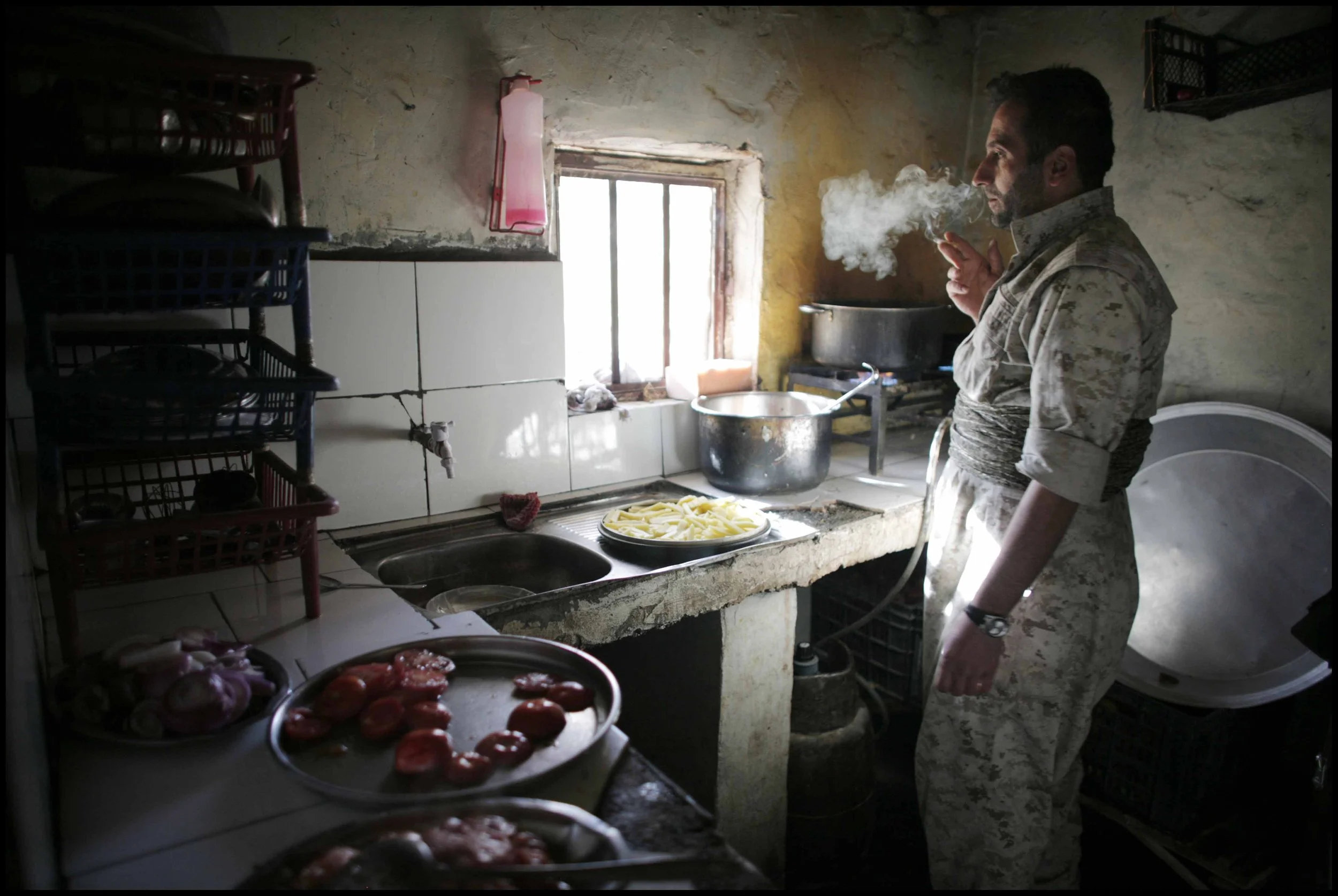 PJAK Qandil mountains, Kurdistan.
A control centre where the fighters are based during the day before heading for cover at night. Everyone is very proficient at cooking.