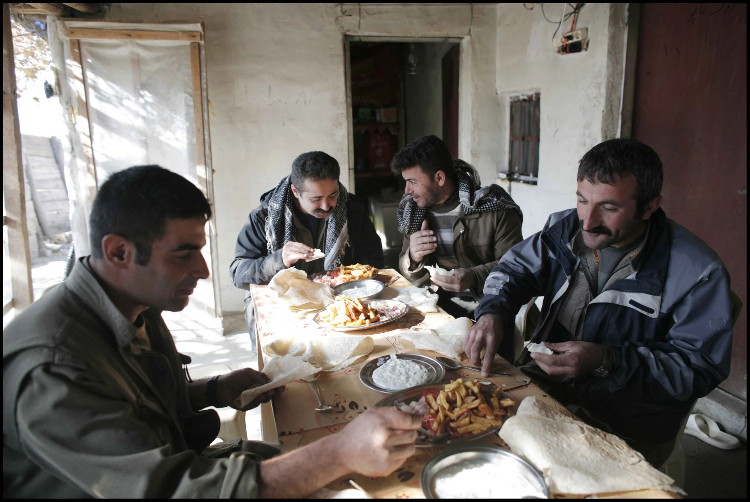 PJAK Qandil mountains, Kurdistan.
A control centre where the fighters are based during the day before heading for cover at night. Everyone is very proficient at cooking.