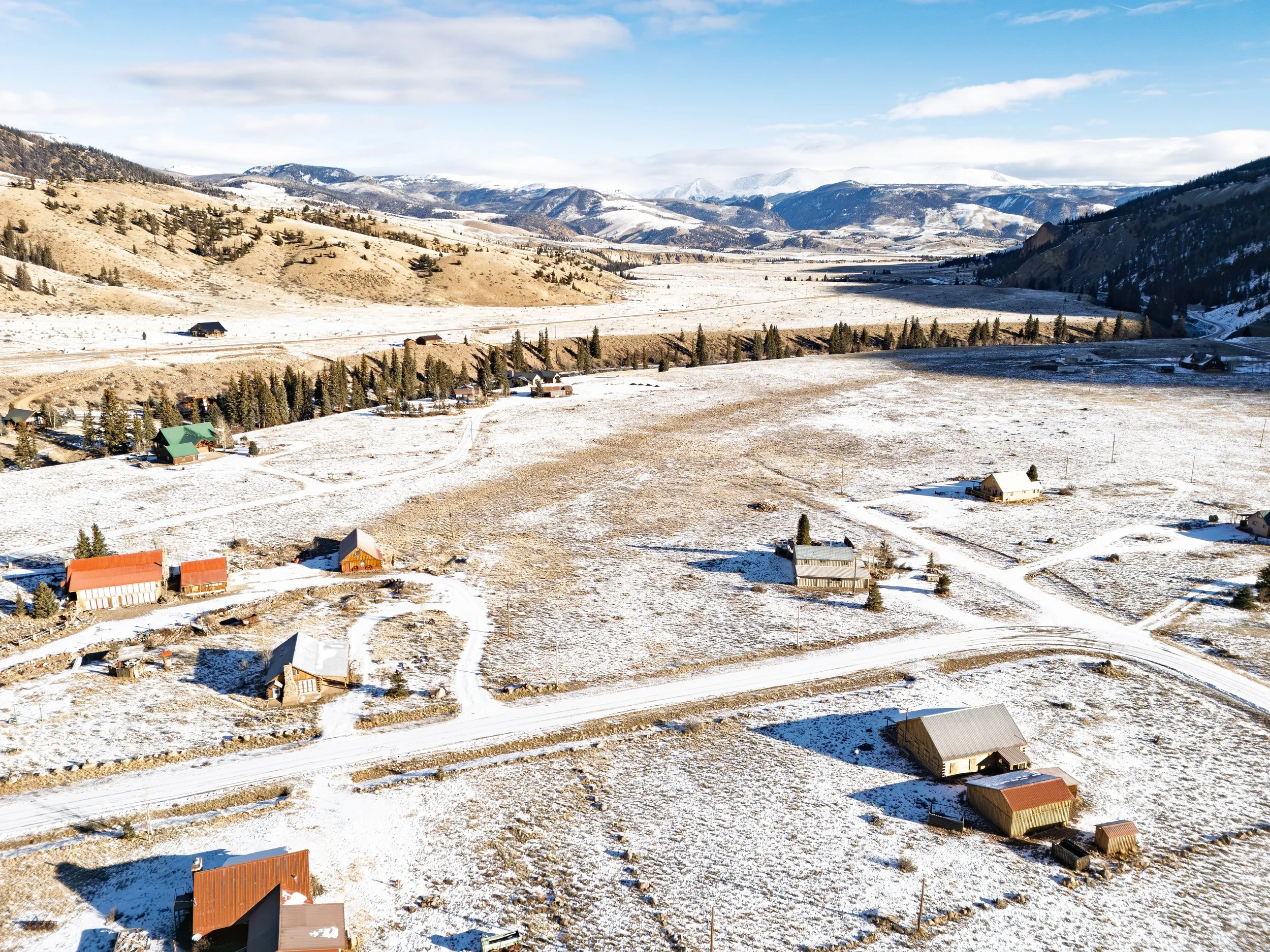 Aerial photo of home in mountain valley
