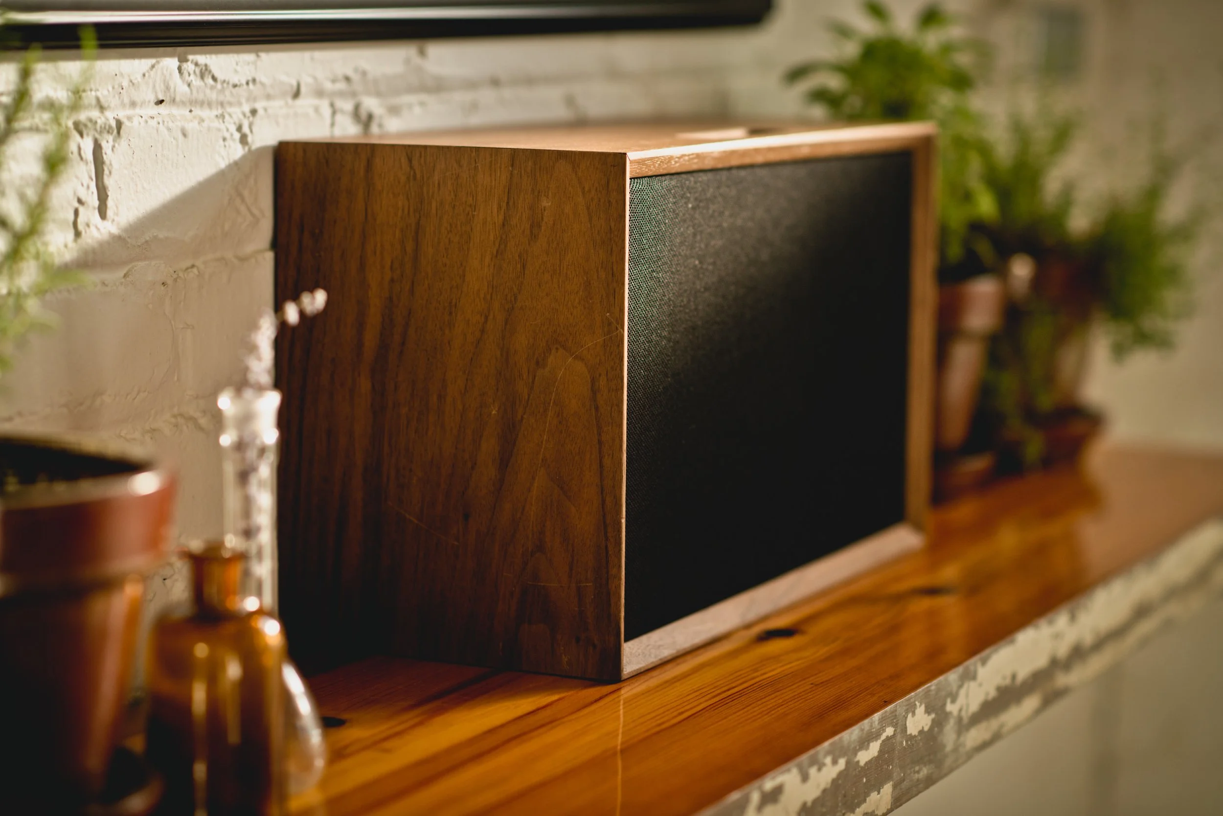 Handcrafted Leon Tonecase Tc5s hardwood speaker cabinet in walnut finish with a black fabric grille. Charlotte, NC.