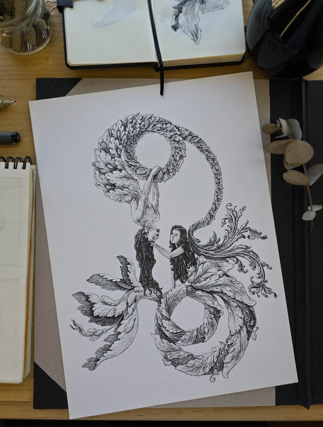 Final ink illustration “Mémoire” by Daniel Perez Cabrera: two mythological sea creatures in inverted symmetry, joined in intimate gesture, serving as central visual element for speculative red wine packaging.