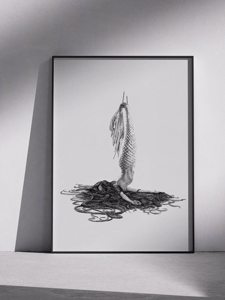 Ink drawing “Big Fish” by Daniel Perez Cabrera: mermaid hung upside down by the tail, resembling a tuna, with head, arms, and hair spilling downward. Support not visible, highlighting fragility and myth reinterpretation through ancestral symbols.