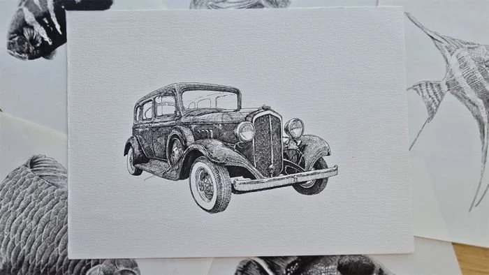 Ink drawings for “Sleeping with the Fishes” by Daniel Perez Cabrera: 1933 Chevrolet in focus with fragmented fish sketches, representing preparatory stage before digital composition.