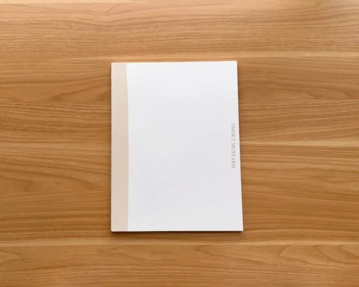 Smoky Mustard (2024) - Handmade Softcover
9 x 12&rdquo;
60pg
Linen Spine
Foil Stamped title

All work is your life&rsquo;s work and all work teaches you something. This book taught me that linen spines are kind of a pain in the ass and that I don&rsq