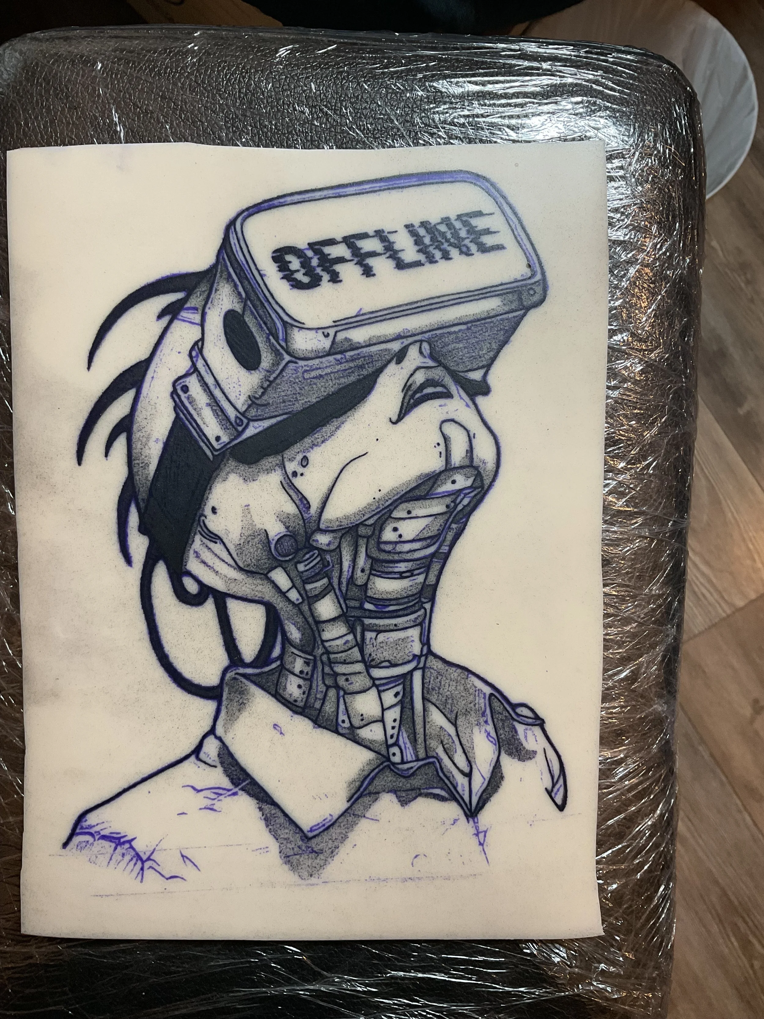 A drawing of a person with robotic and futuristic features wearing a virtual reality headset labeled 'OFFLINE'.